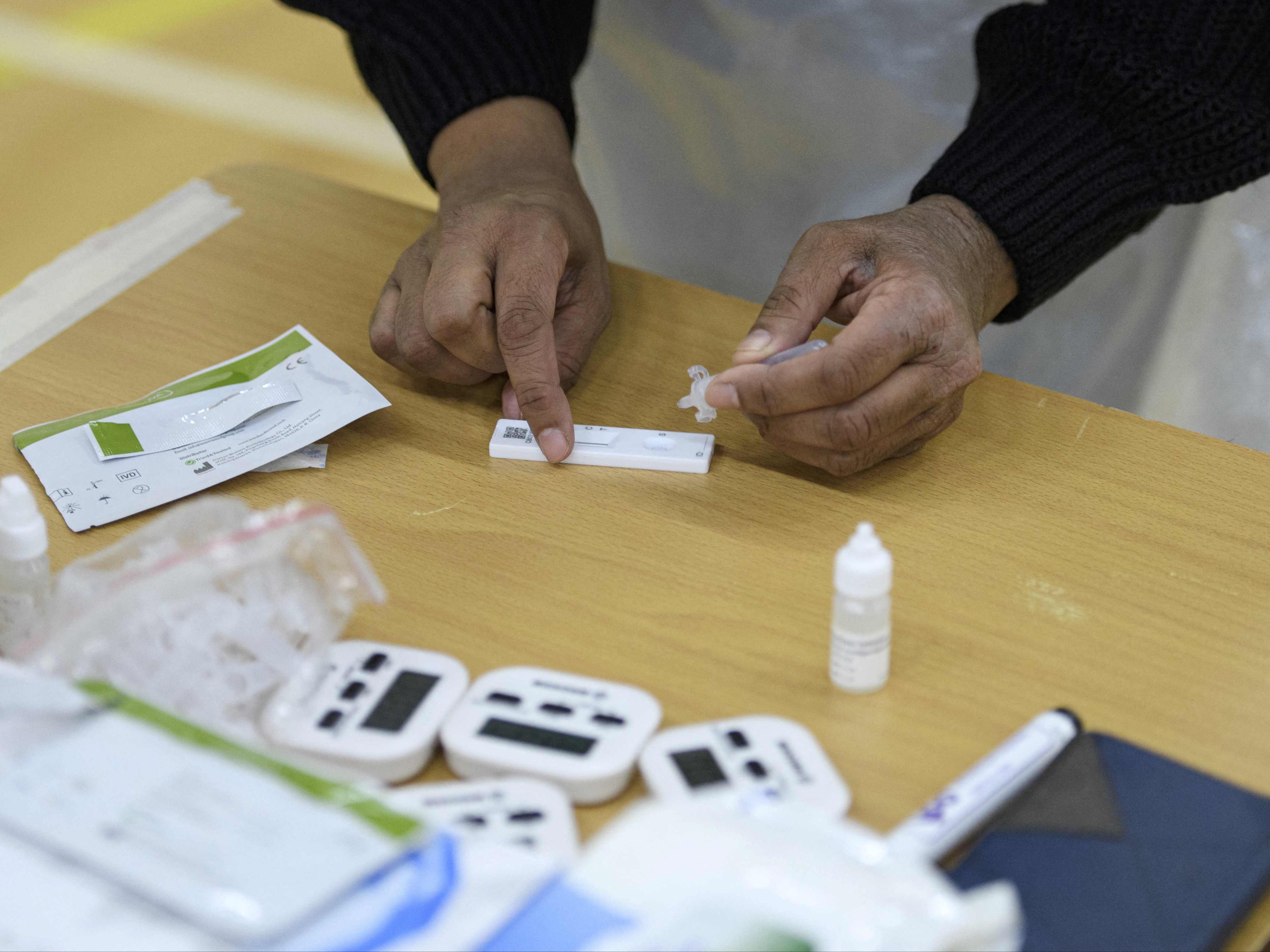 Covid UK news – live: PCR test rule change begins as Scotland to lift restrictions on large outdoor events