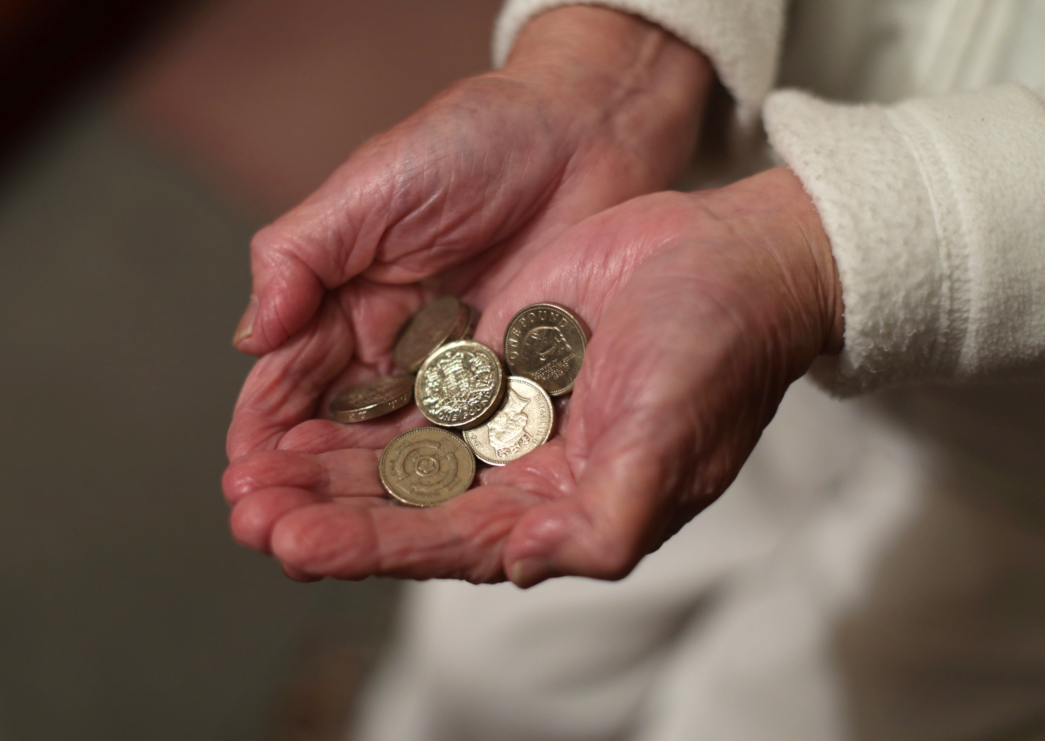 Nearly one in four people living with cancer have found it easier to talk about their illness than the impact on their finances, says Macmillan Cancer Support (Yui Mok/PA)