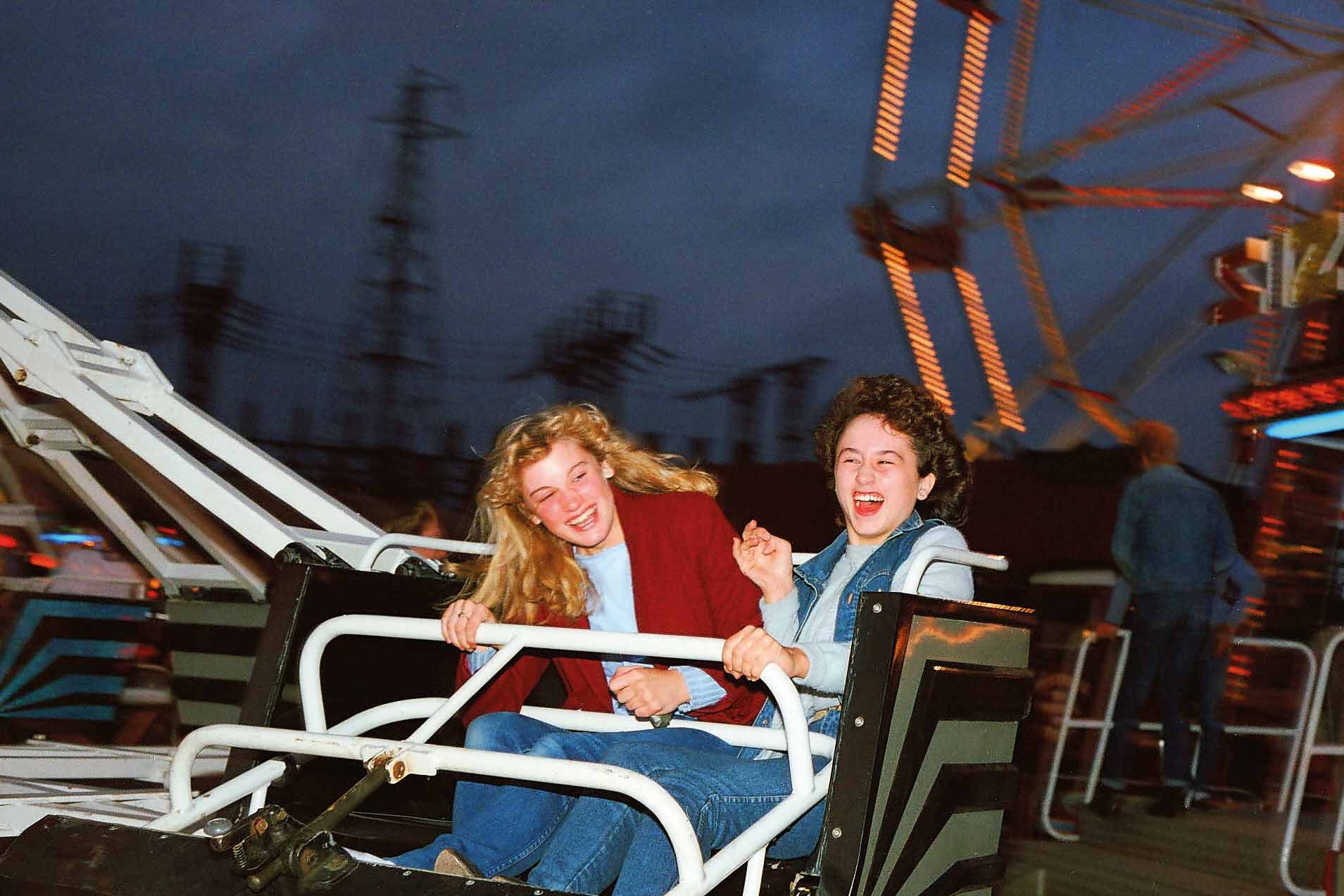 School friends Toni Cray and Teresa Weston on the Sizzler at the Town Bridge Fair in Peterborough in 1985