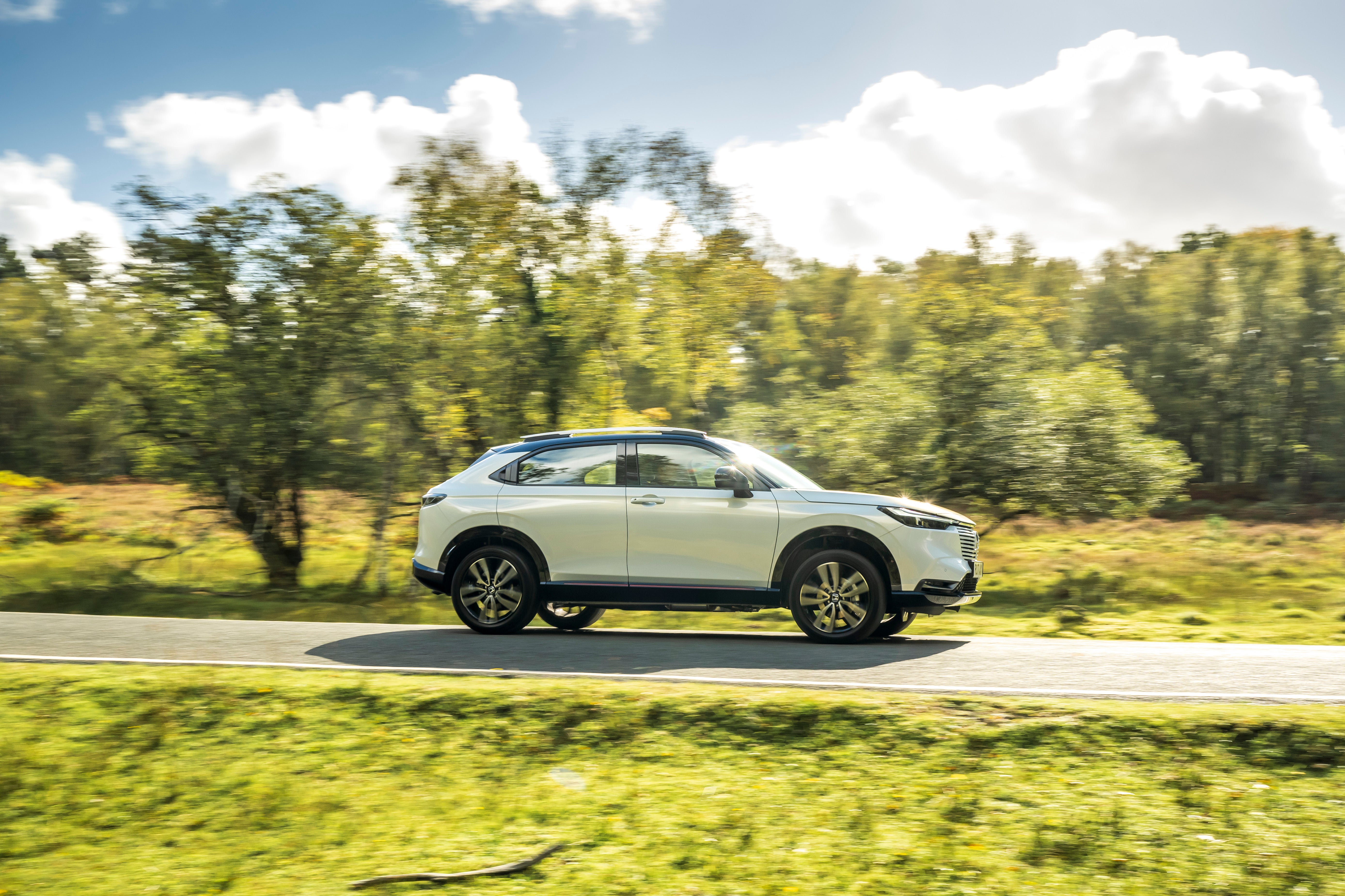 The coupe-SUV styling, with concealed door handles on the rear passenger doors, makes it look like a three-door vehicle