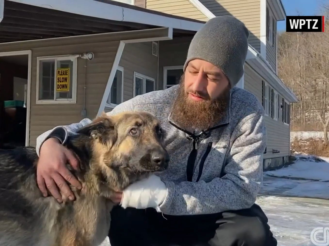 Tinsley and her owner, Cam Laundry, after she helped save him from a car crash