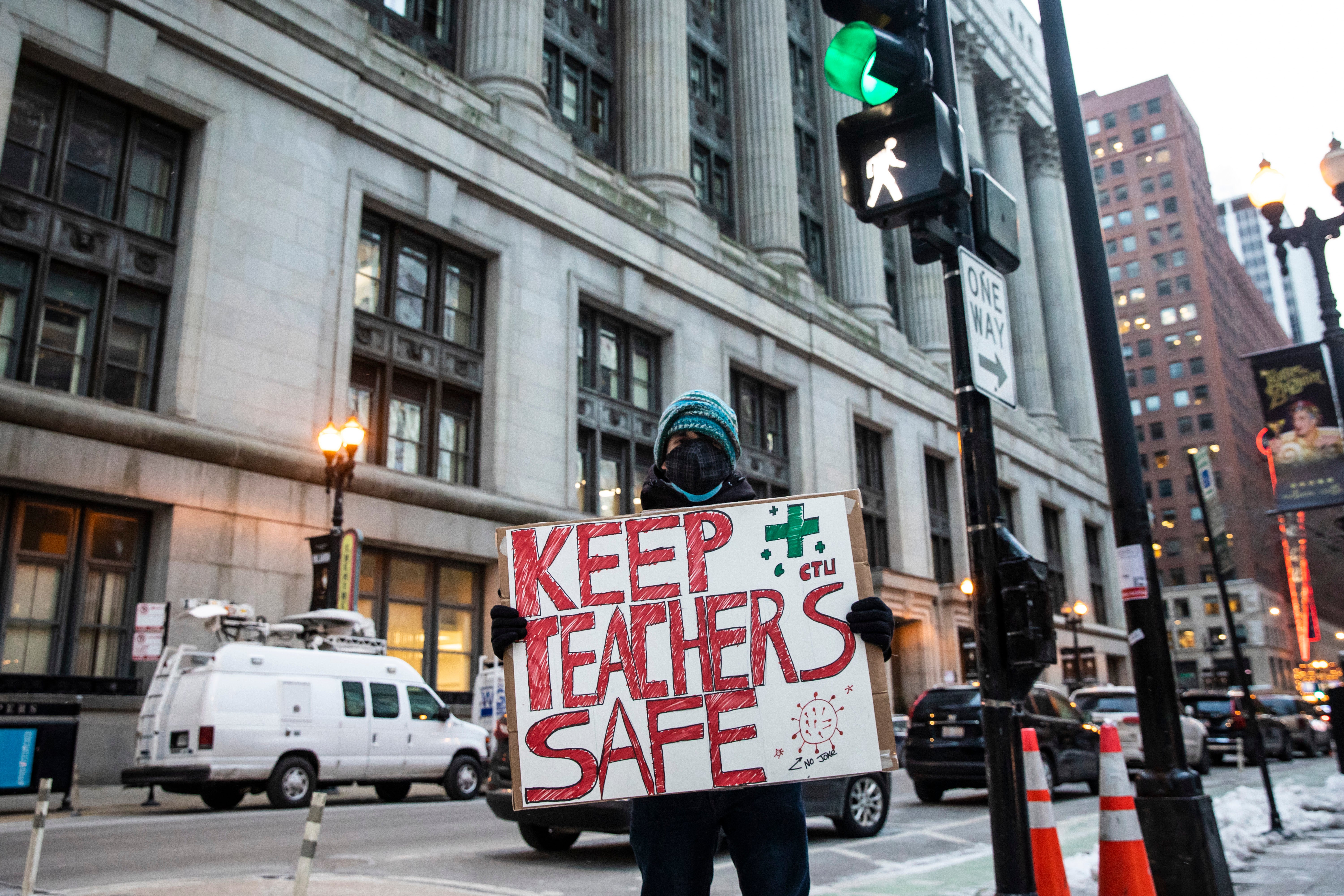 Virus Outbreak Chicago Schools