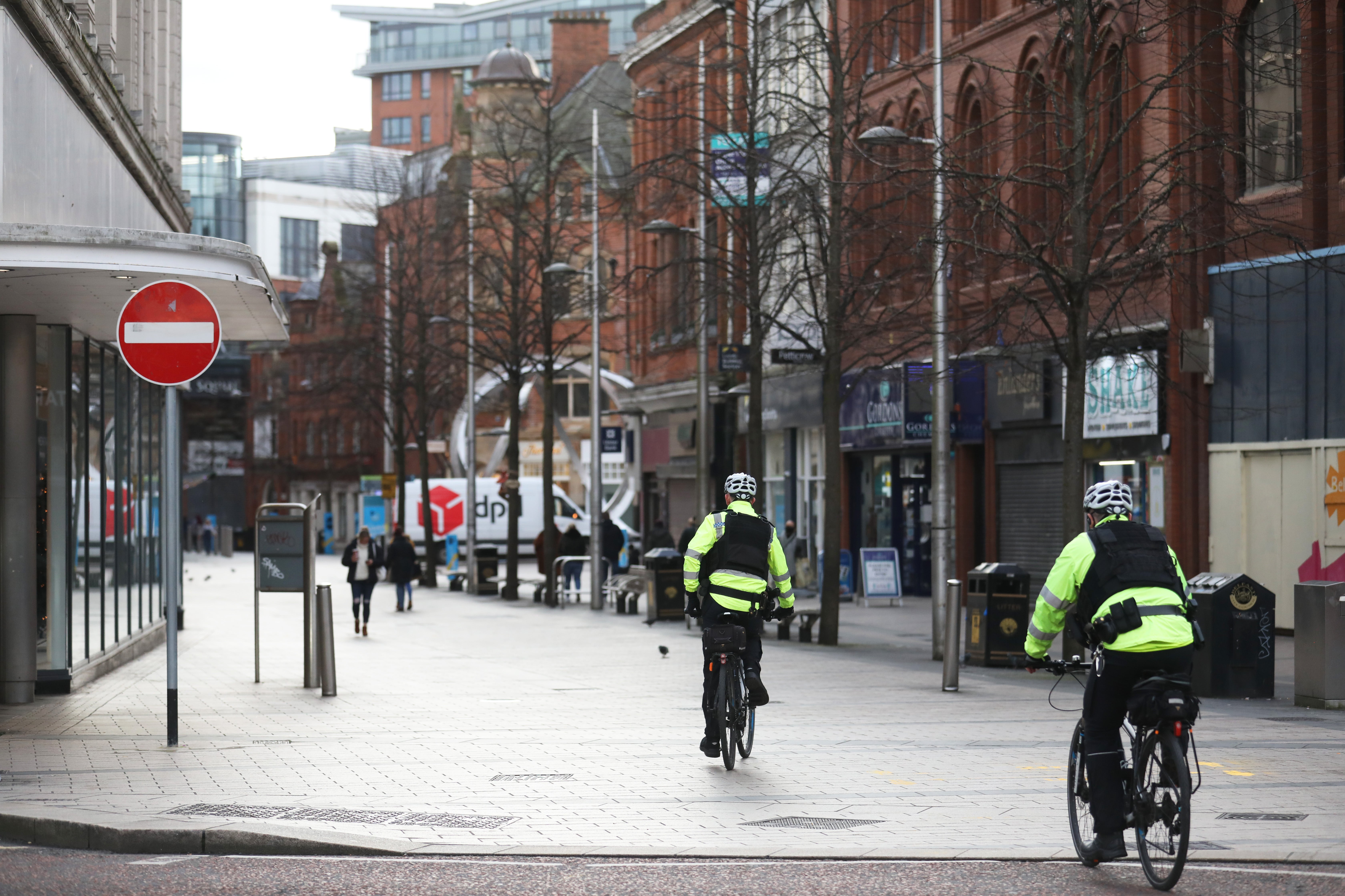 Police patrol Belfast city centre (Peter Morrison/PA)