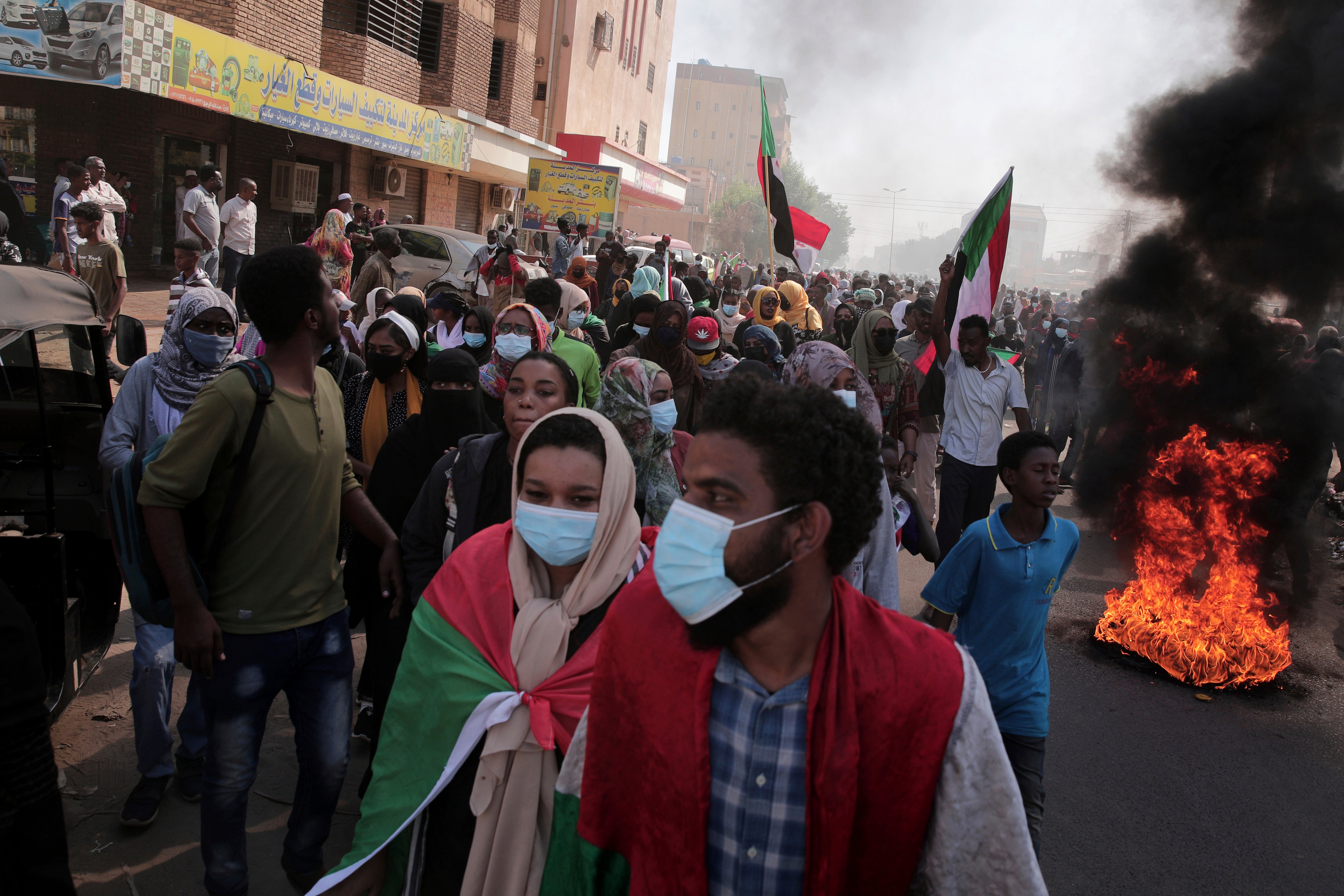 People chant slogans during a protest to denounce the military coup, in Khartoum, Sudan, 6 January 2022