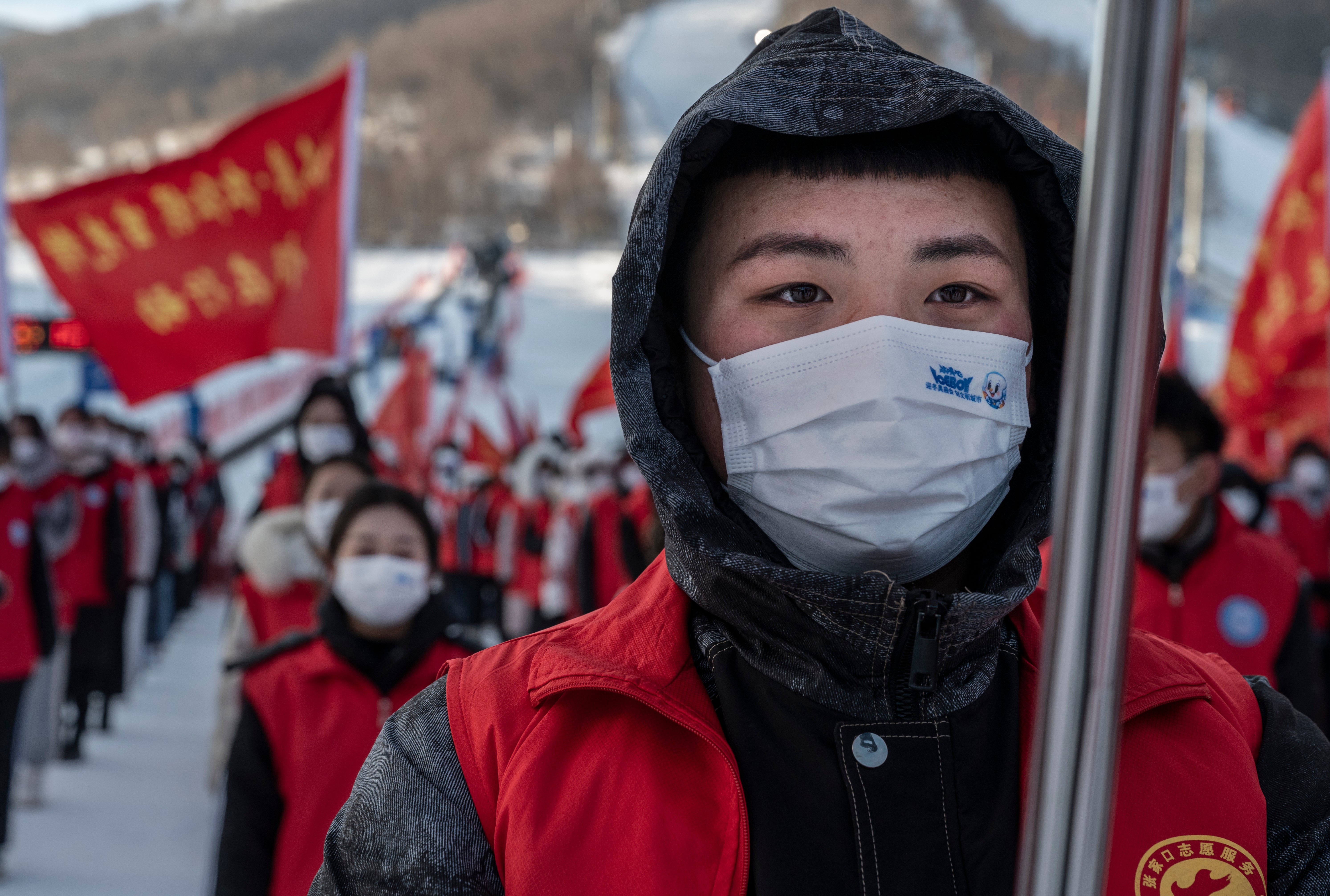 A volunteer from China’s local Communist Party organisation who will be part of the support for the Beijing 2022 Winter Olympics