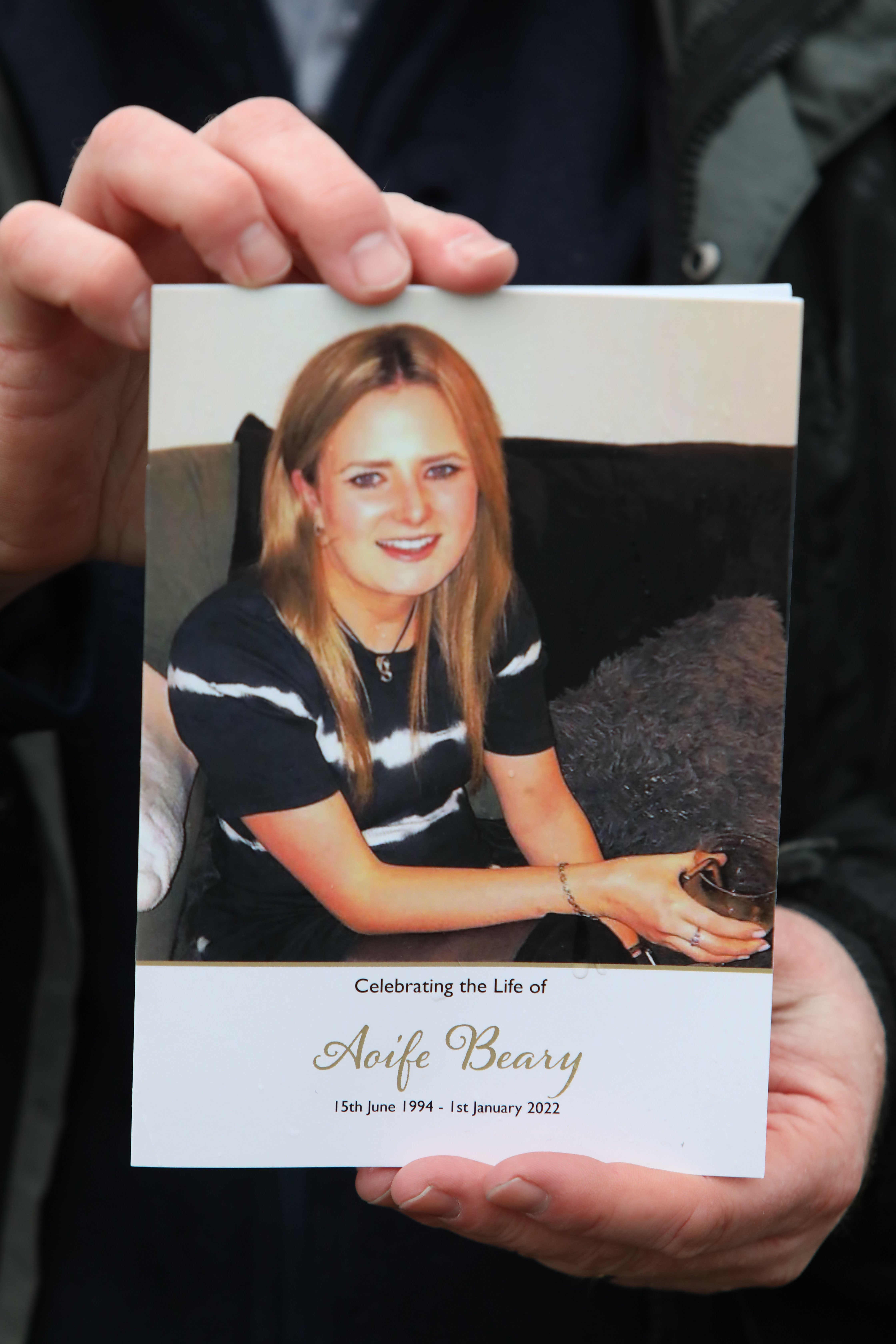 A mourner attending the funeral of Aoife Beary (Garrett White/PA)