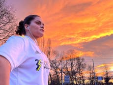 ‘I am free but my mind is not’: girls from Afghan youth football team fear for relatives left in Afghanistan