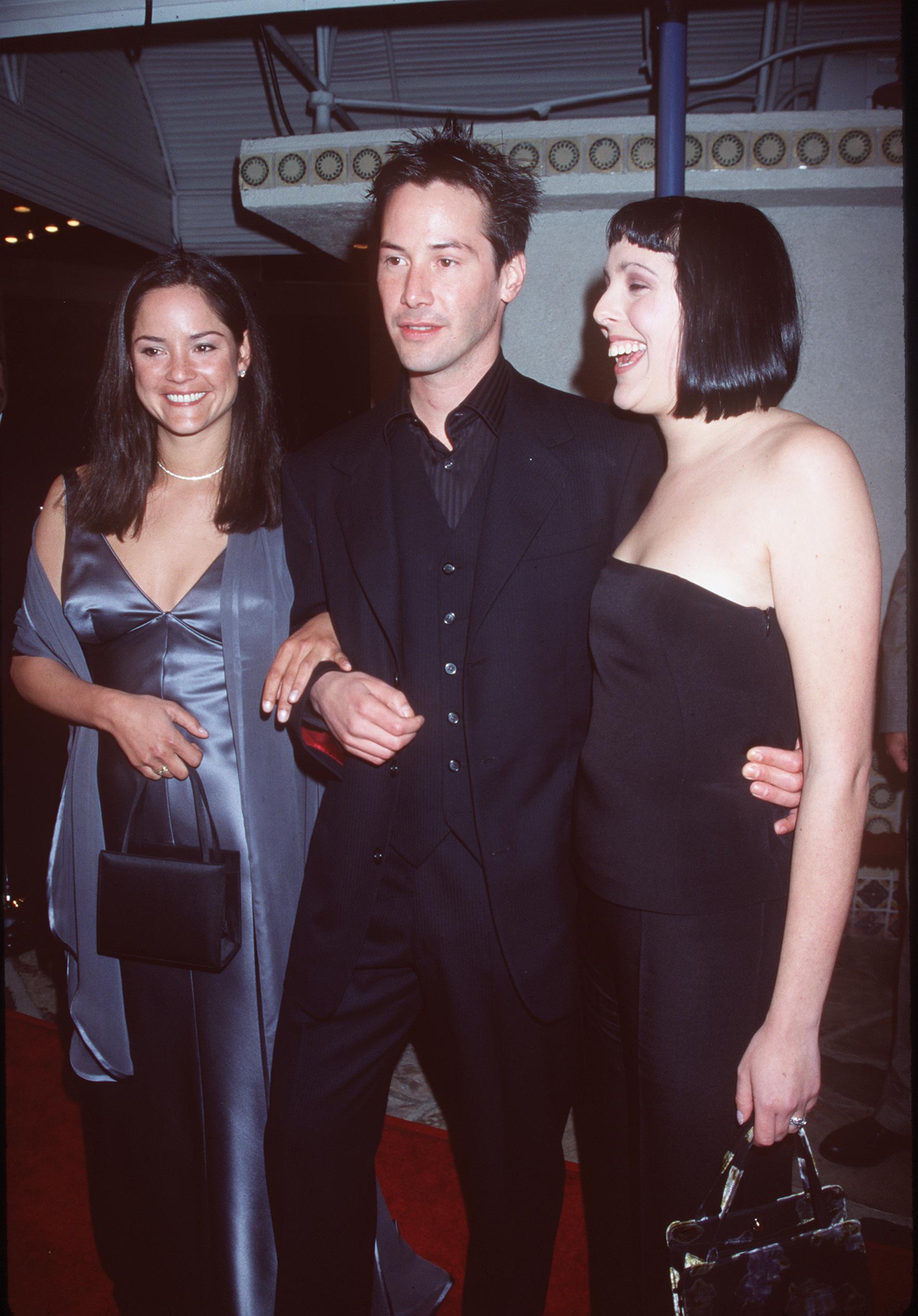 Keanu Reeves with his sisters Kim Reeves (left) and Karina Miller (right) at the premiere of ‘The Matrix’ on 24 March 1999 in Westwood, California