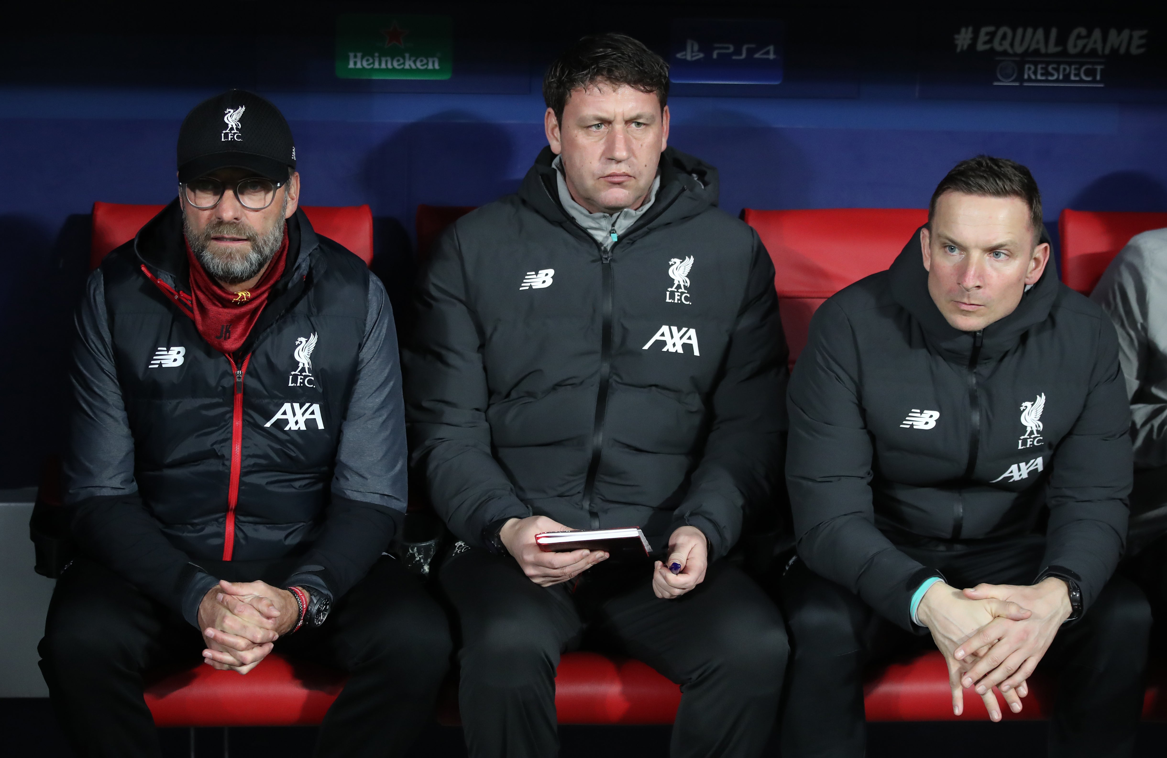 Liverpool assistant coach Peter Krawietz, centre, has been holding fort in the absence of Jurgen Klopp, left, and Pepijn Lijnders (Nick Potts/PA)