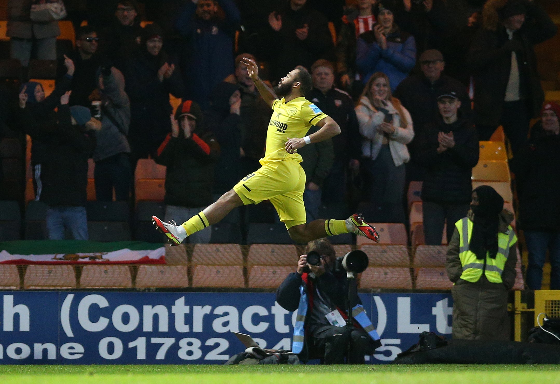 Bryan Mbeumo celebrates his first goal against Port Vale (Nigel French/PA)