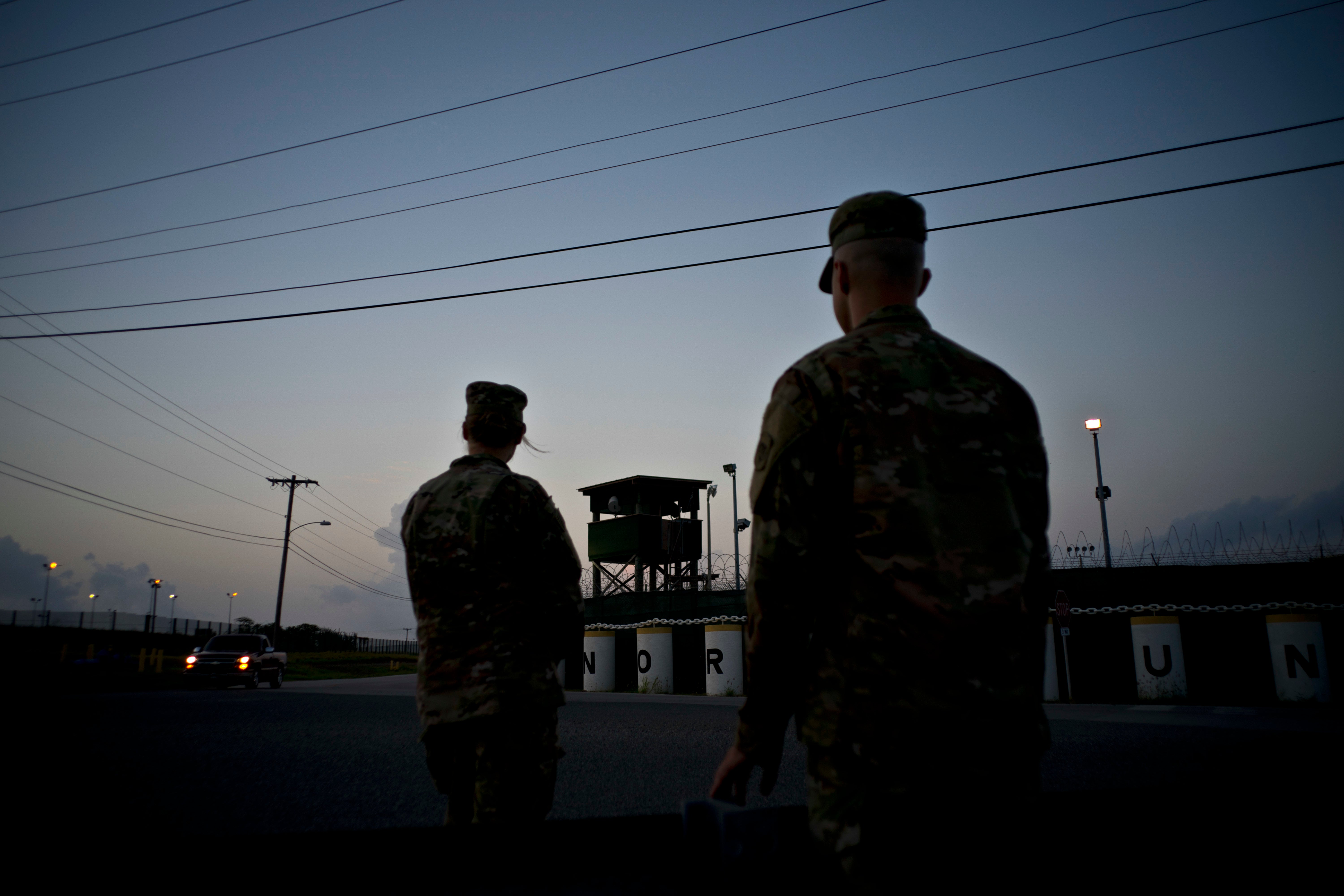 Troops stand guard outside Camp Delta at the Guantanamo Bay detention centre in Cuba