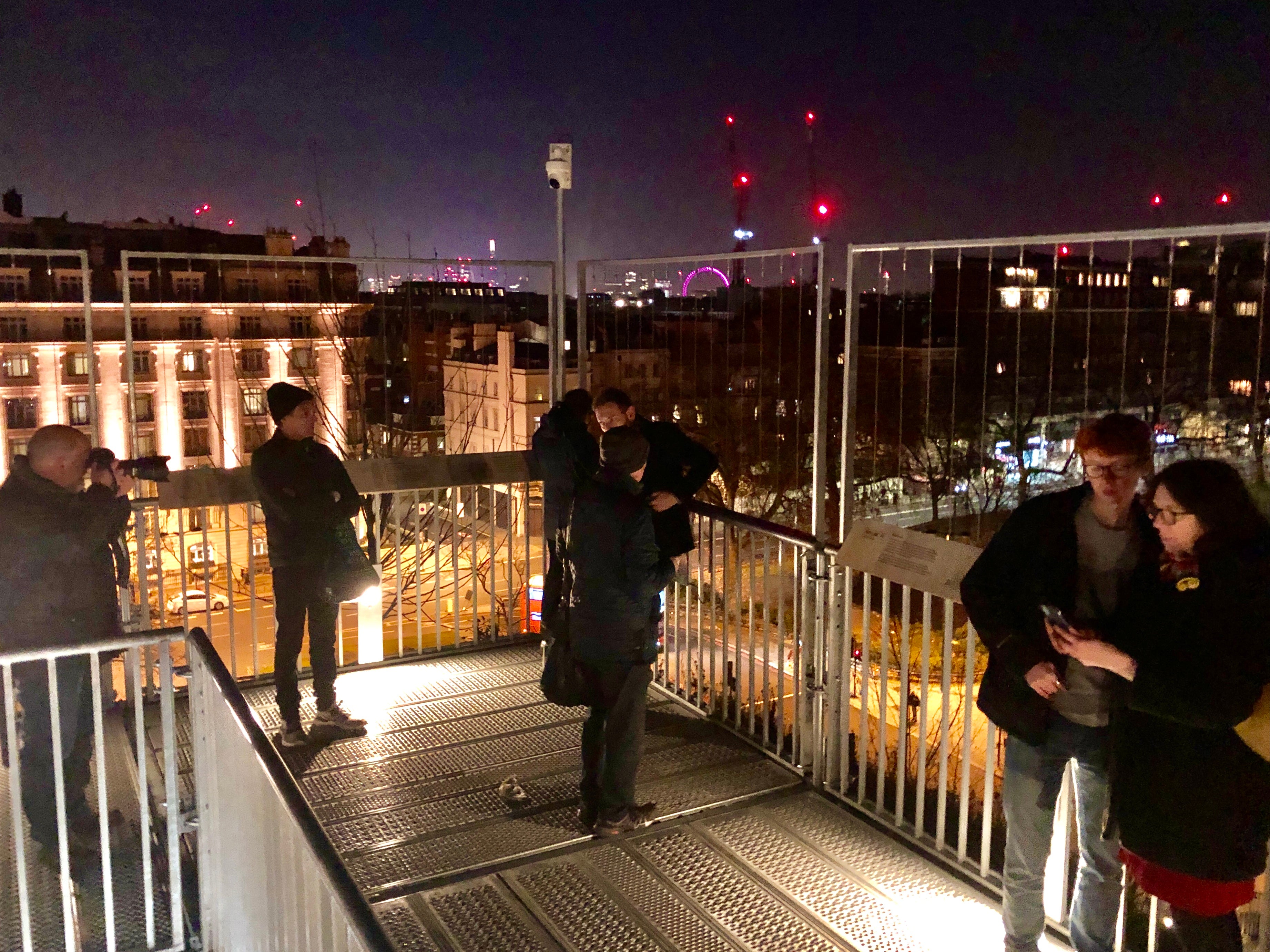 Last chance: the final visitors at the summit of the Marble Arch Mound