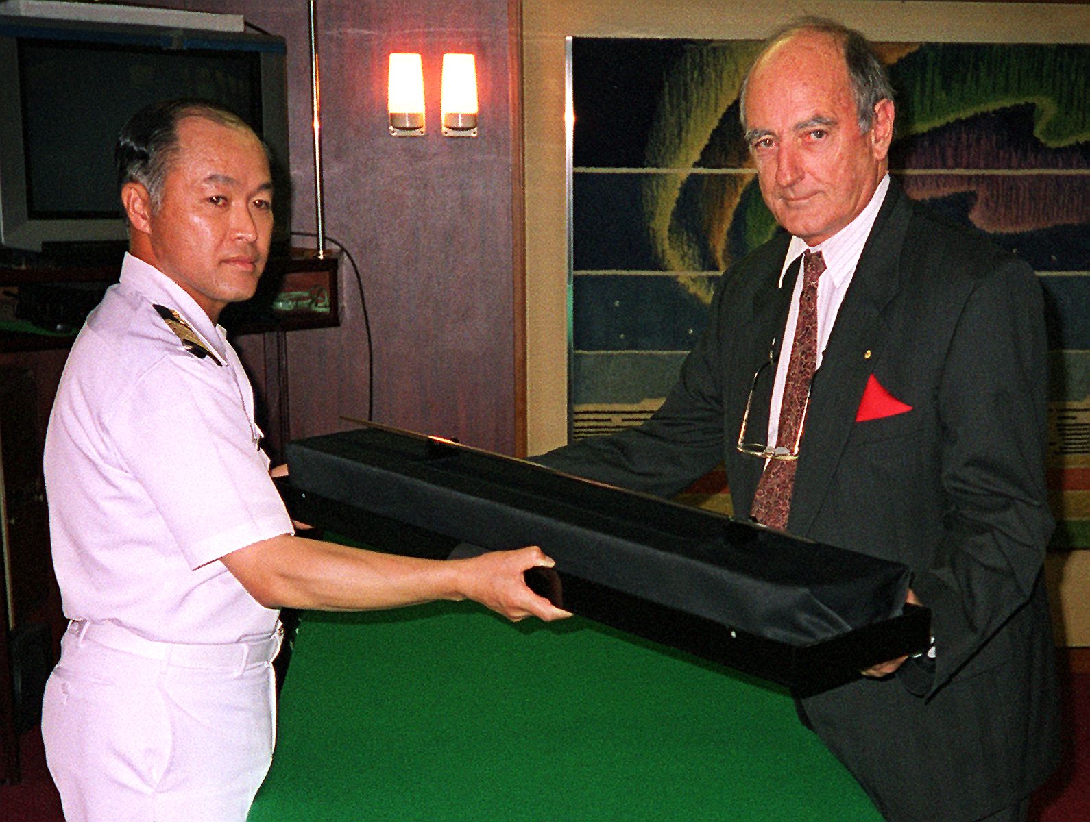 Shirase Masakazu Chosa, captain of the Japanese icebreaker, and Dr Des Griffin, director of the Australian Museum, in Sydney with Shirase’s sword