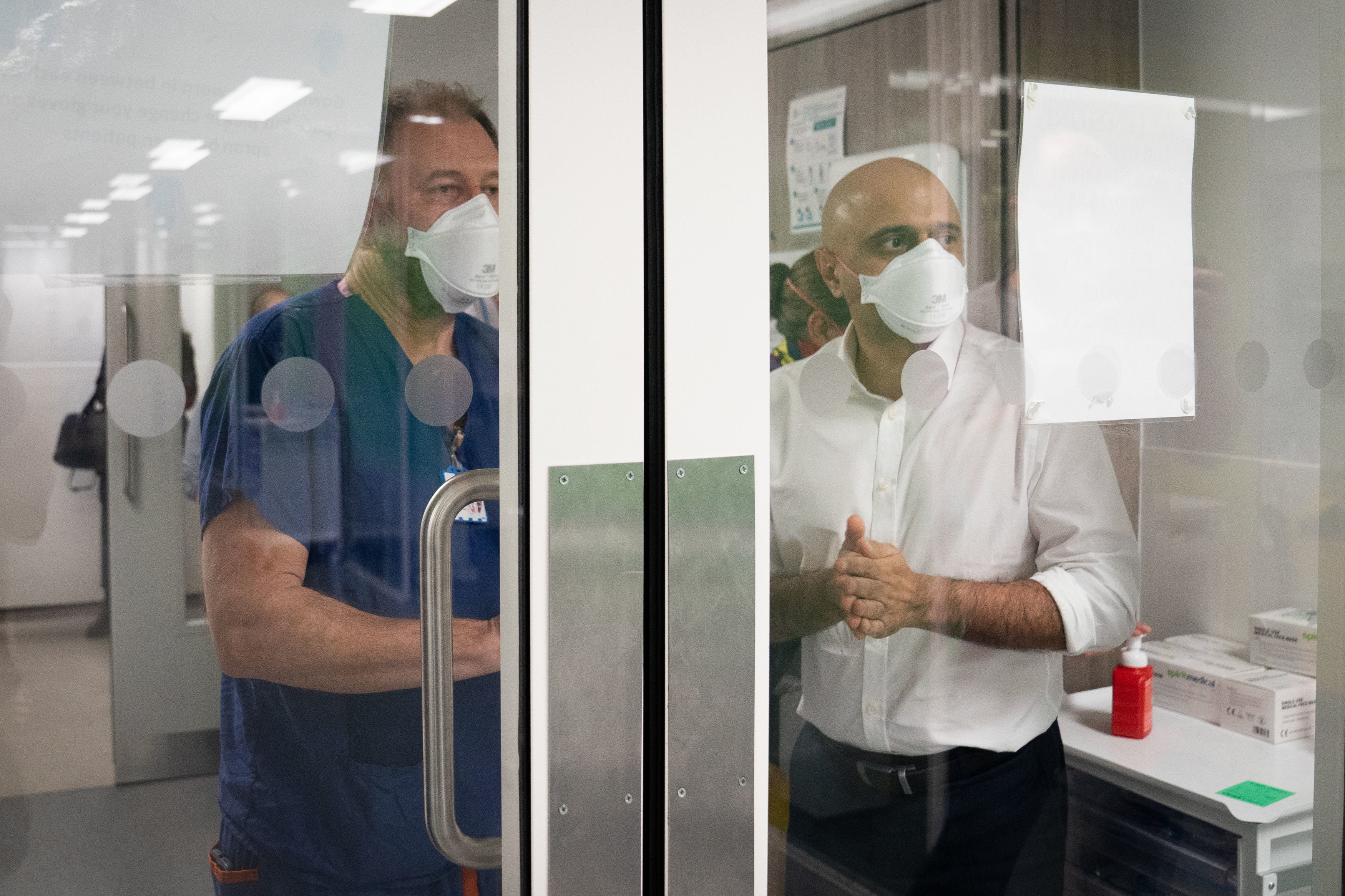 Sajid Javid meets staff in a Covid Intensive Care Unit during a visit to Kings College Hospital in London on Friday 7 January, 2022