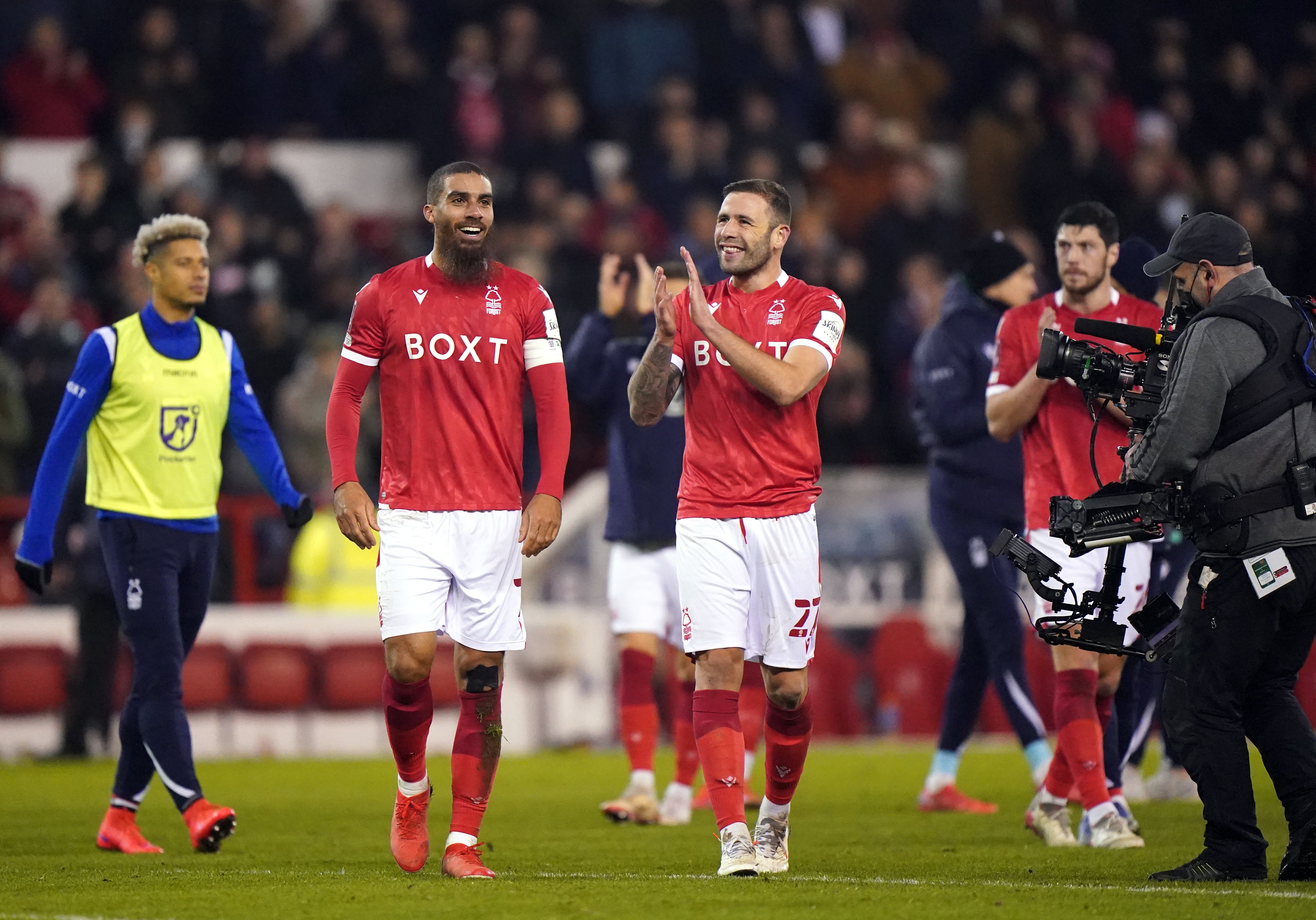 Lewis Grabban and Steve Cook, right, celebrating their win (Tim Goode/PA)