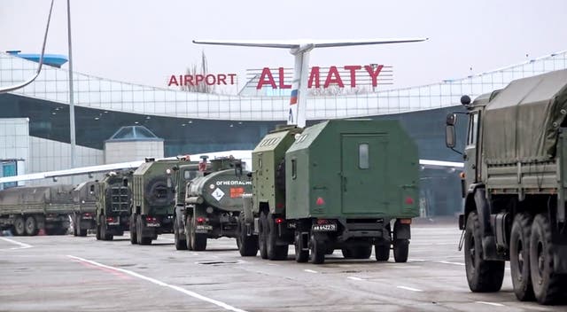 <p>Pictures from the Russian Defence Ministry show vehicles of Russian troops leaving an airport in Almaty, Kazakhstan, Sunday, Jan. 9, 2022.</p>