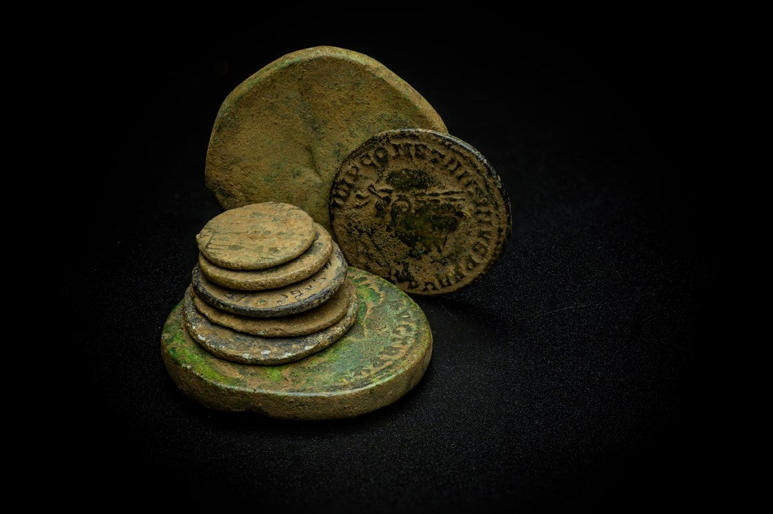 Roman coins uncovered during the archaeology excavation