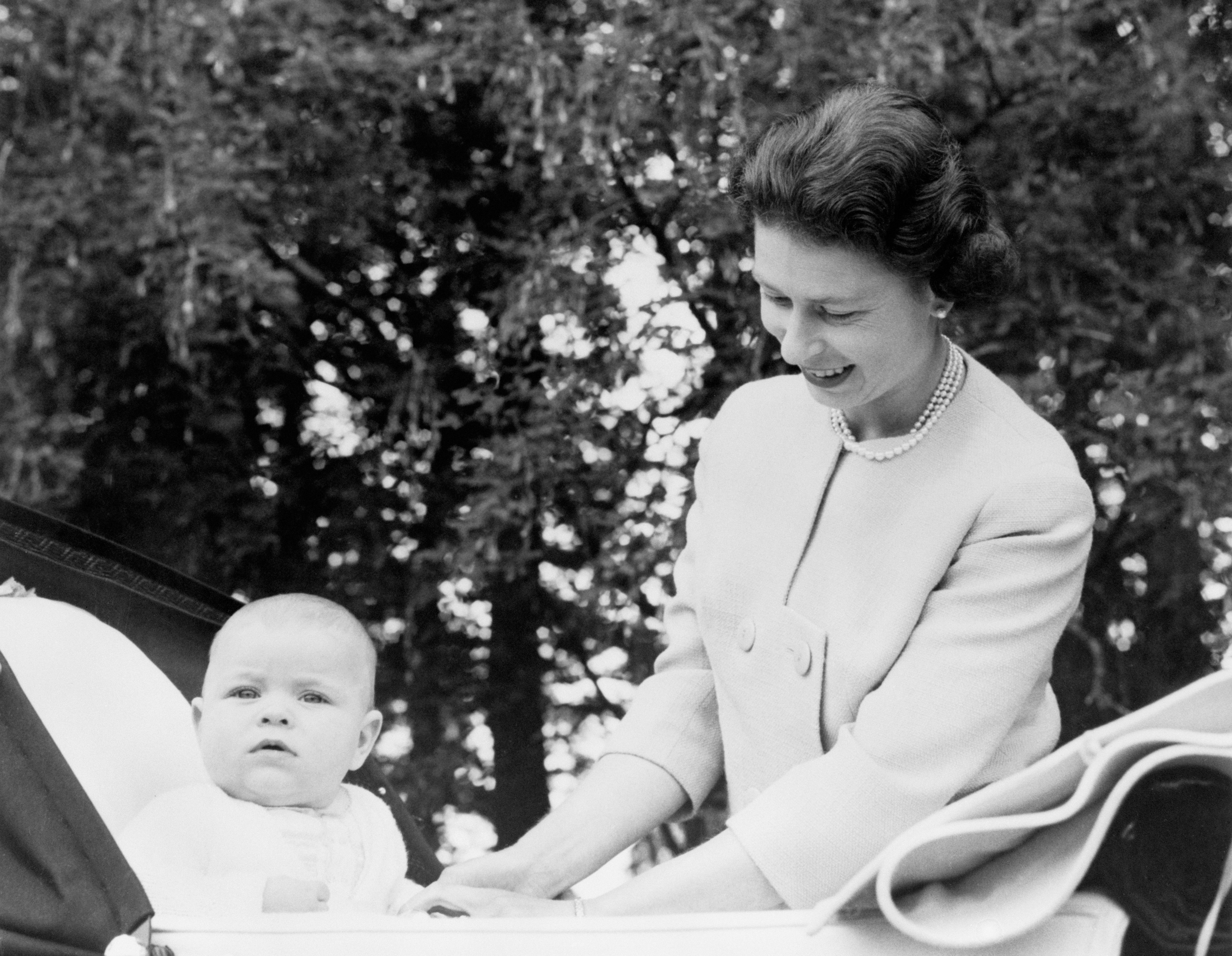 Prince Andrew with the Queen at Balmoral in 1960 (PA)