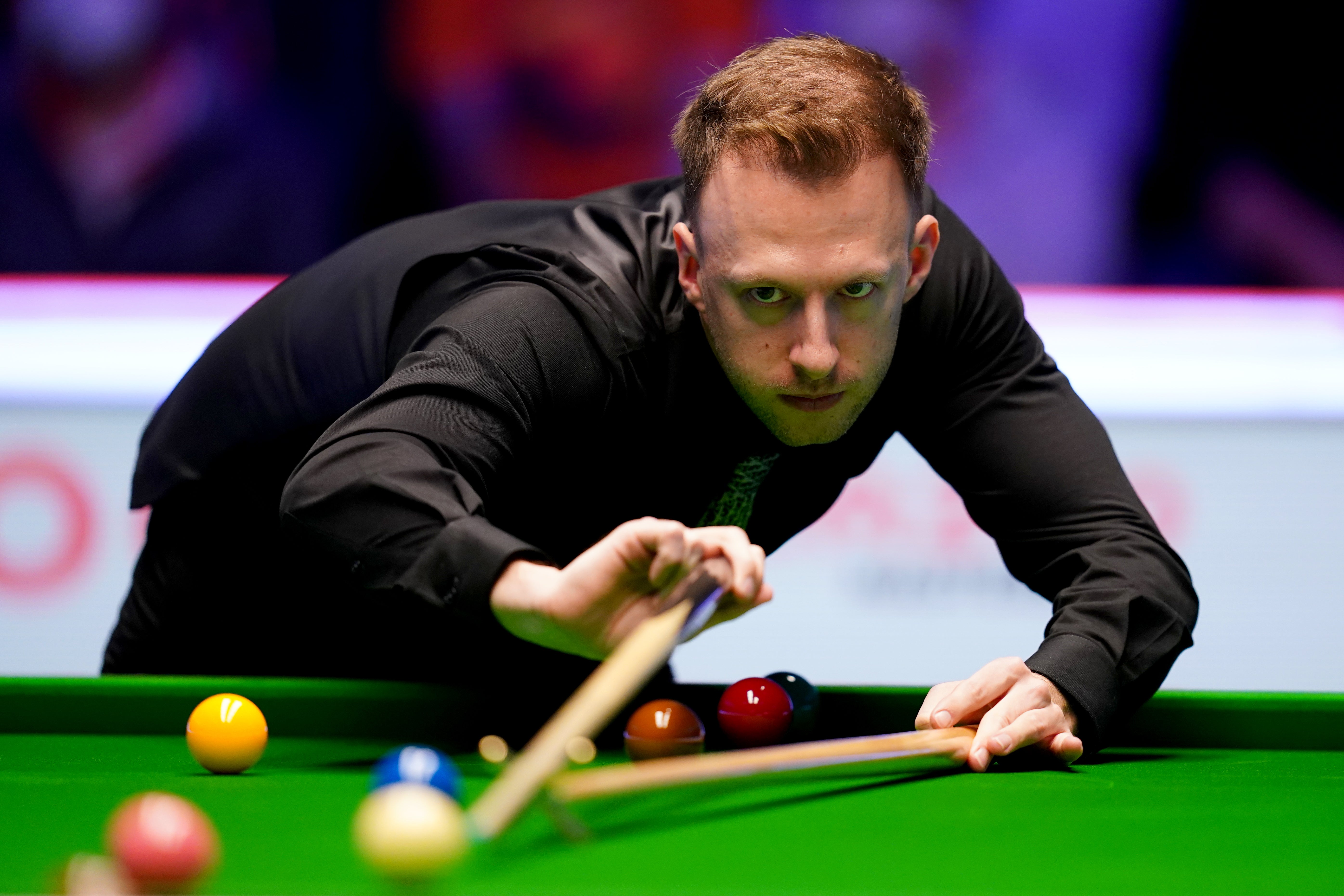 Judd Trump in action against Mark Allen (John Walton/PA)