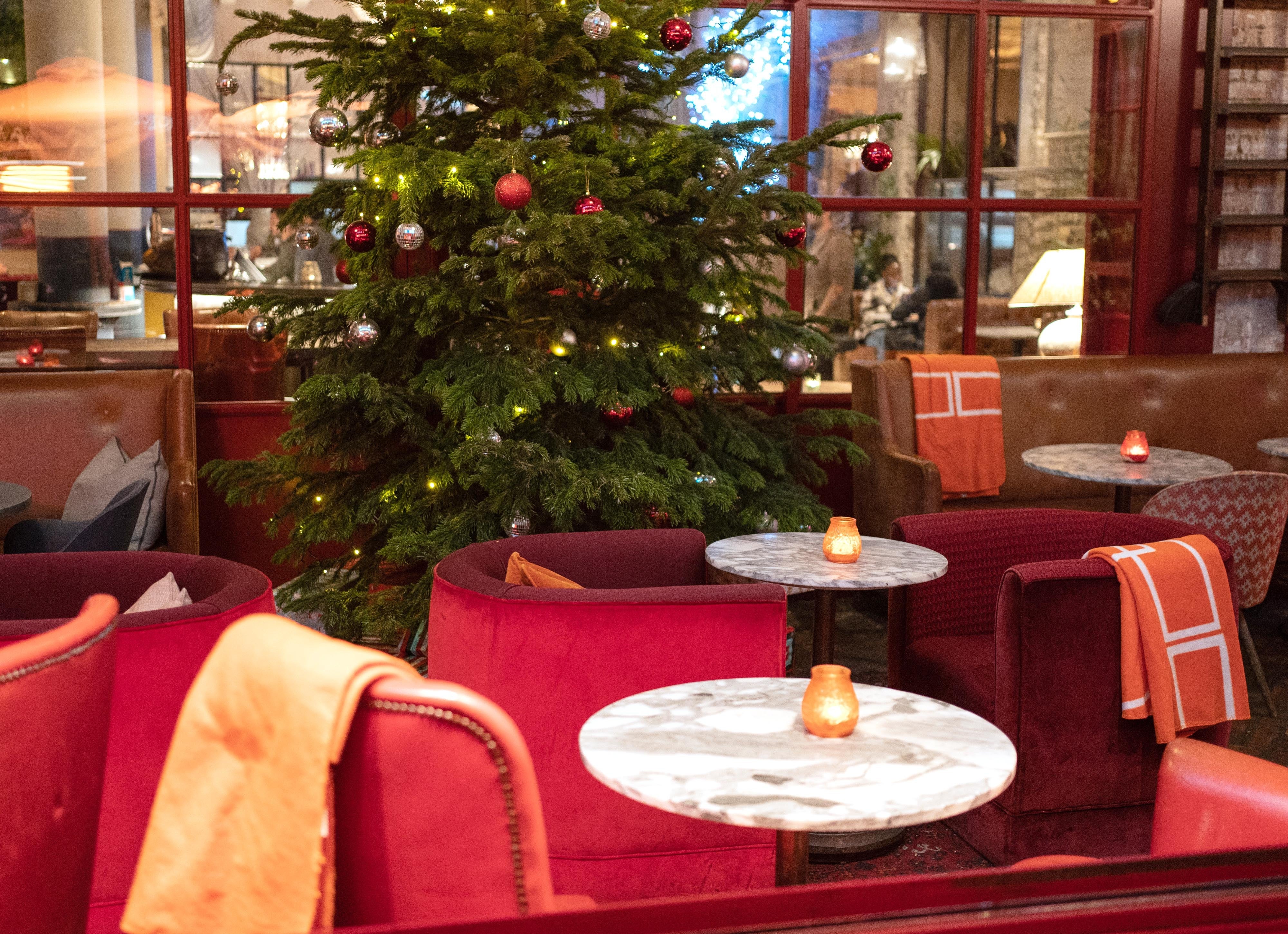 Empty seats outside a restaurant in central London. Pubs and restaurants saw trade plunge over the key Christmas period (Dominic Lipinski/PA)