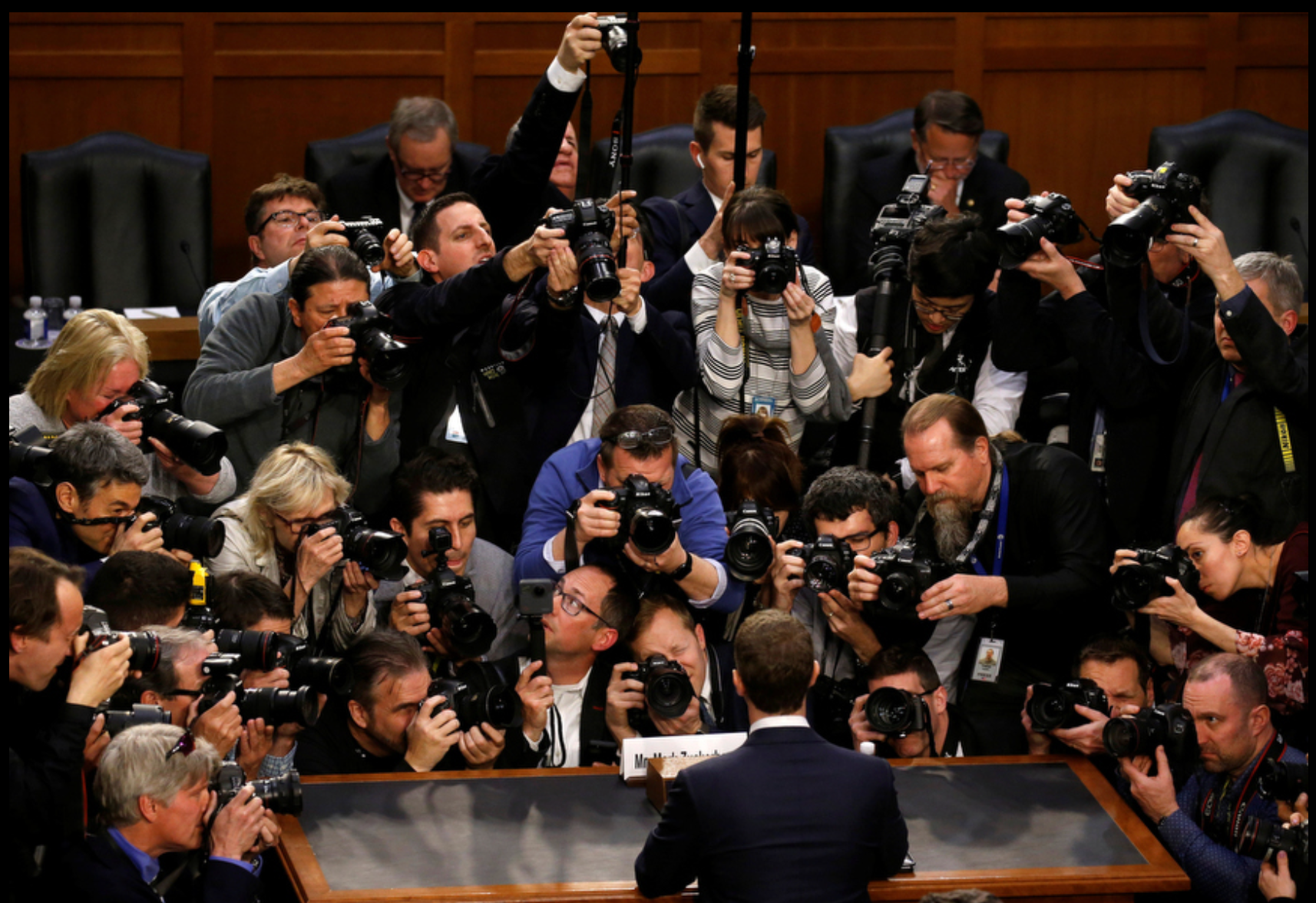 Photograph submitted by Leah Millis of Mark Zuckerberg testifying before a joint senate hearing