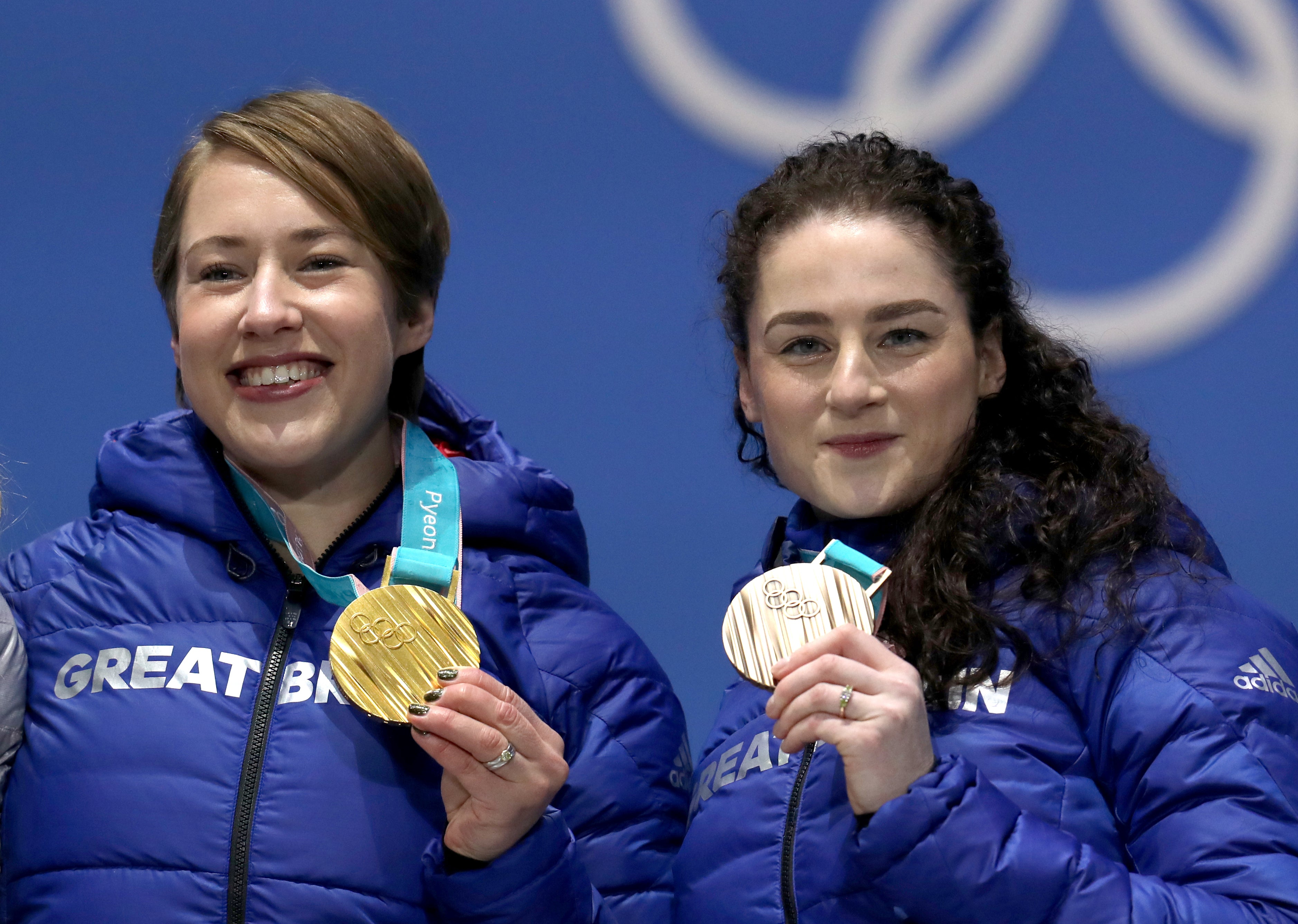 Lizzie Yarnold, left, and Laura Deas celebrate skeleton gold and bronze at Pyeongchang 2018