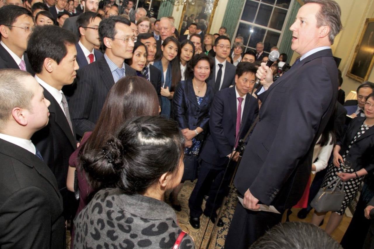 David Cameron speaking at an event, Christine Lee in attendance