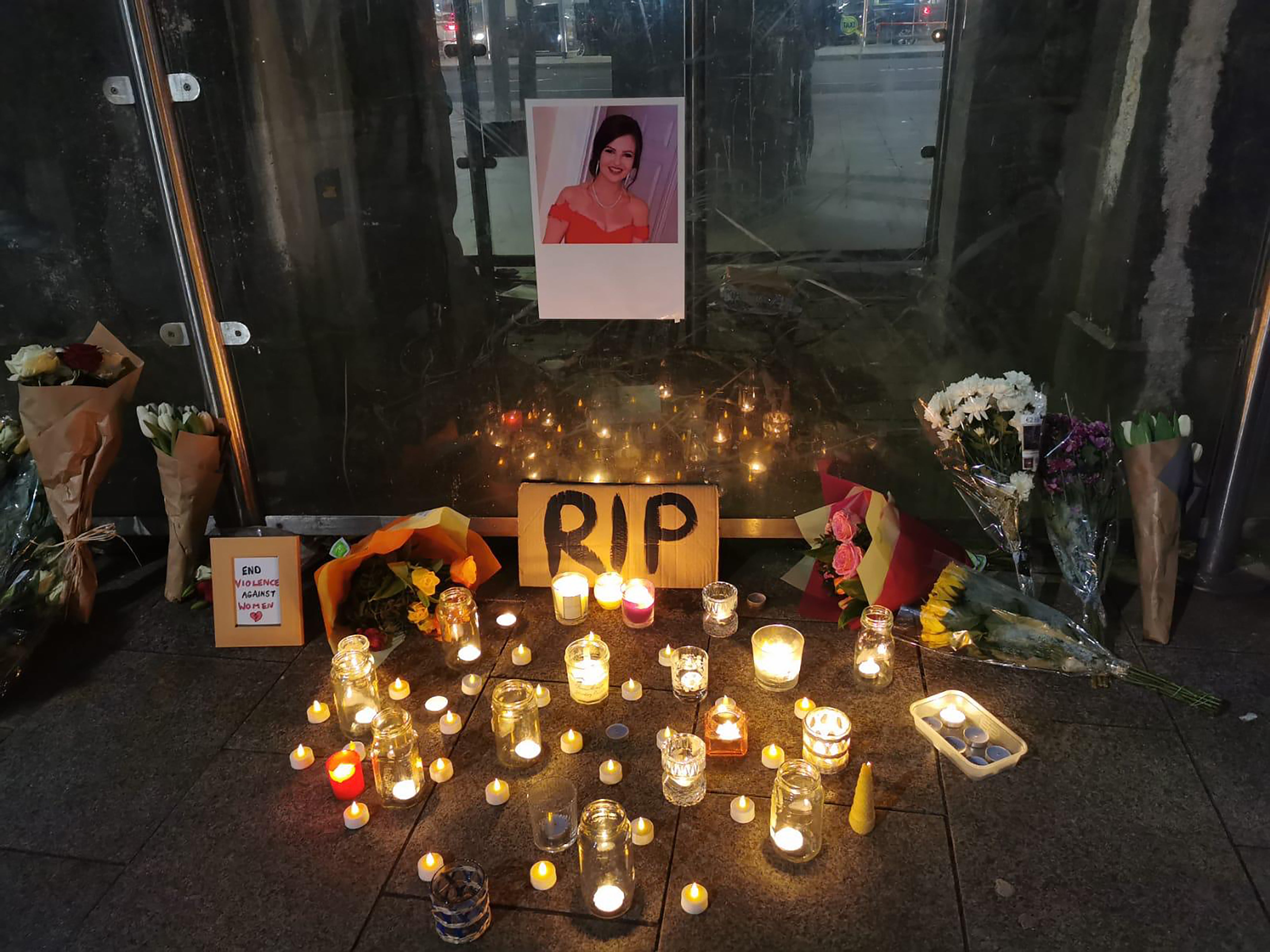 Floral tributes at a vigil attended by hundreds in Galway city centre for Ashling Murphy (Roisin Nic Lochlainn/PA)