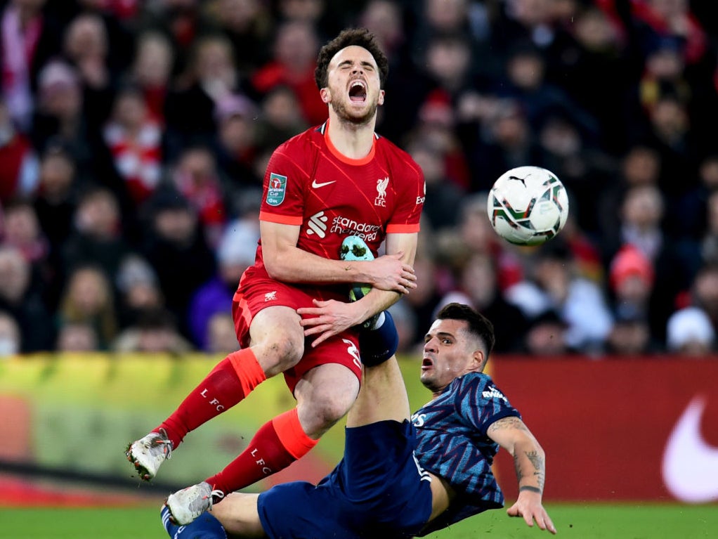 Granit Xhaka (right) was sent off for this challenge on Diogo Jota in January