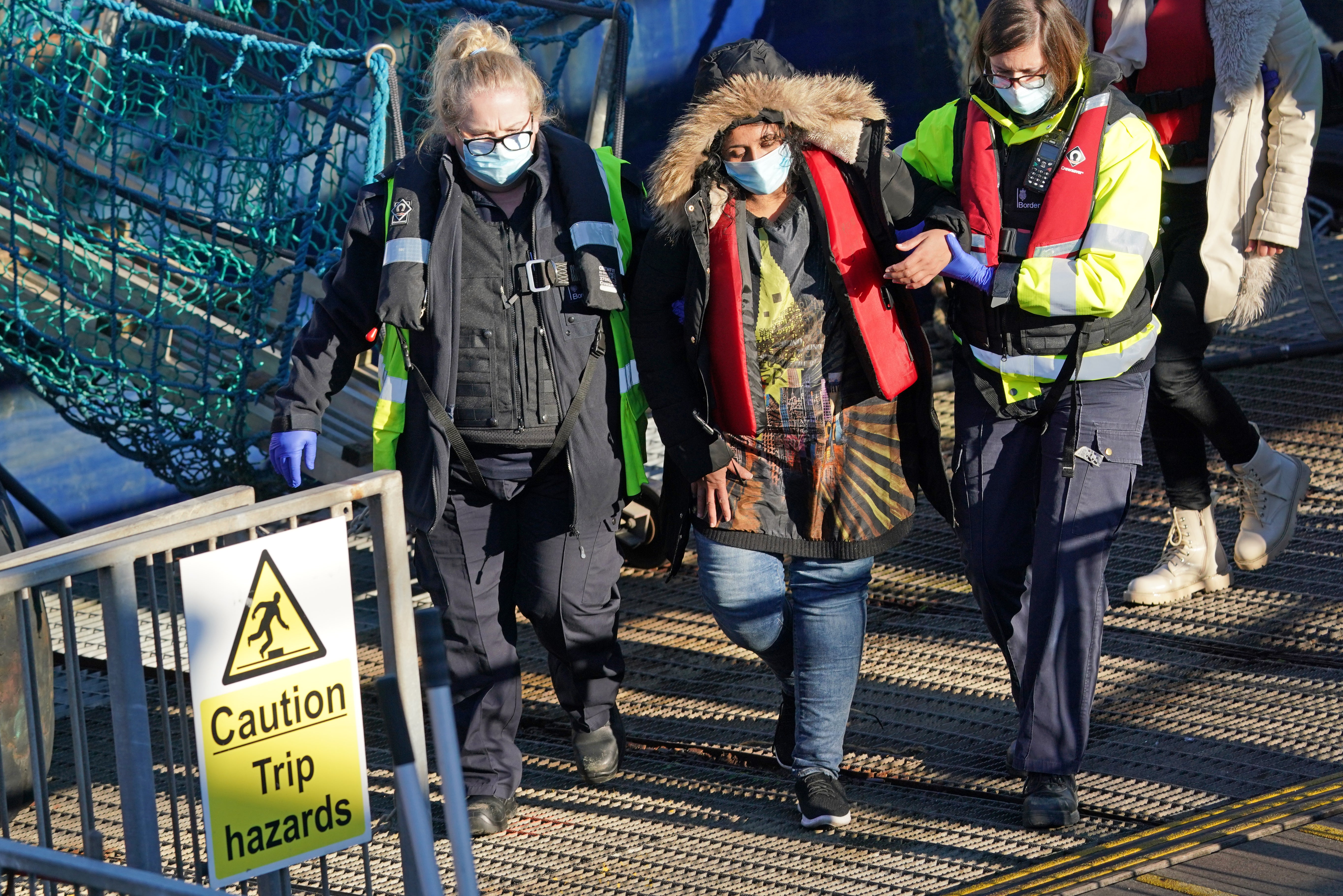 A group of people thought to be migrants are brought in to Dover, Kent, by Border Forcer officers, following a small boat incident in the Channel. Picture date: Thursday January 13, 2022.