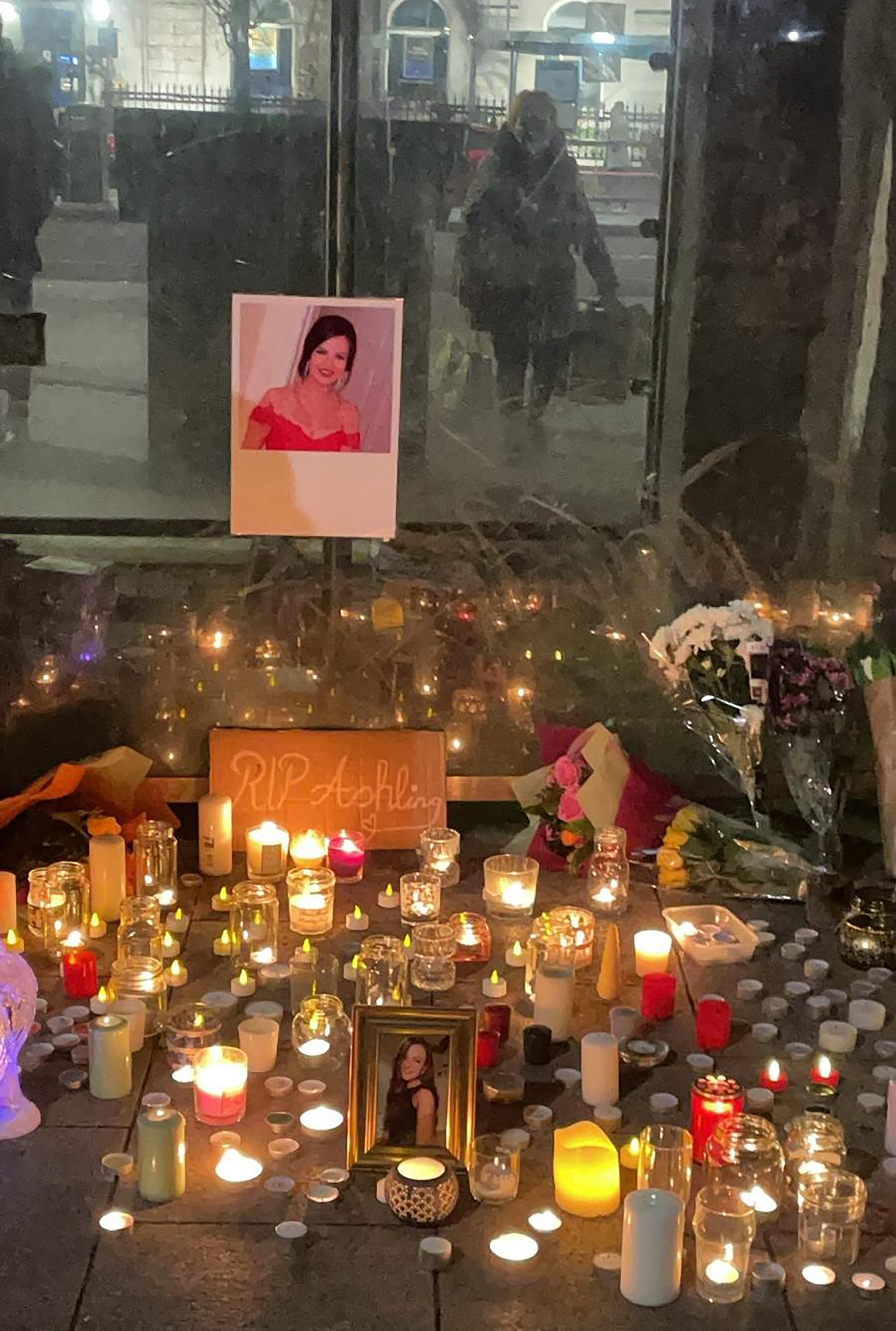 Floral tributes at a vigil attended by hundreds in Galway city centre for Ashling Murphy (Roisin Nic Lochlainn/PA)