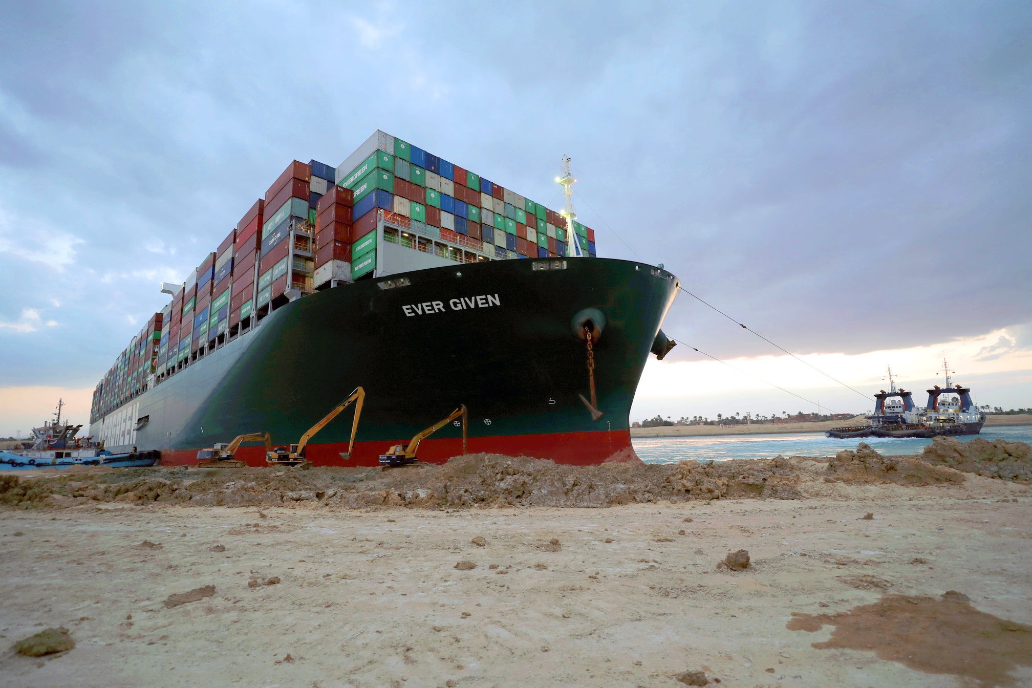 Salvage specialists make use of the high spring tide to excavate the Ever Given’s stern from the bank of the Suez Canal