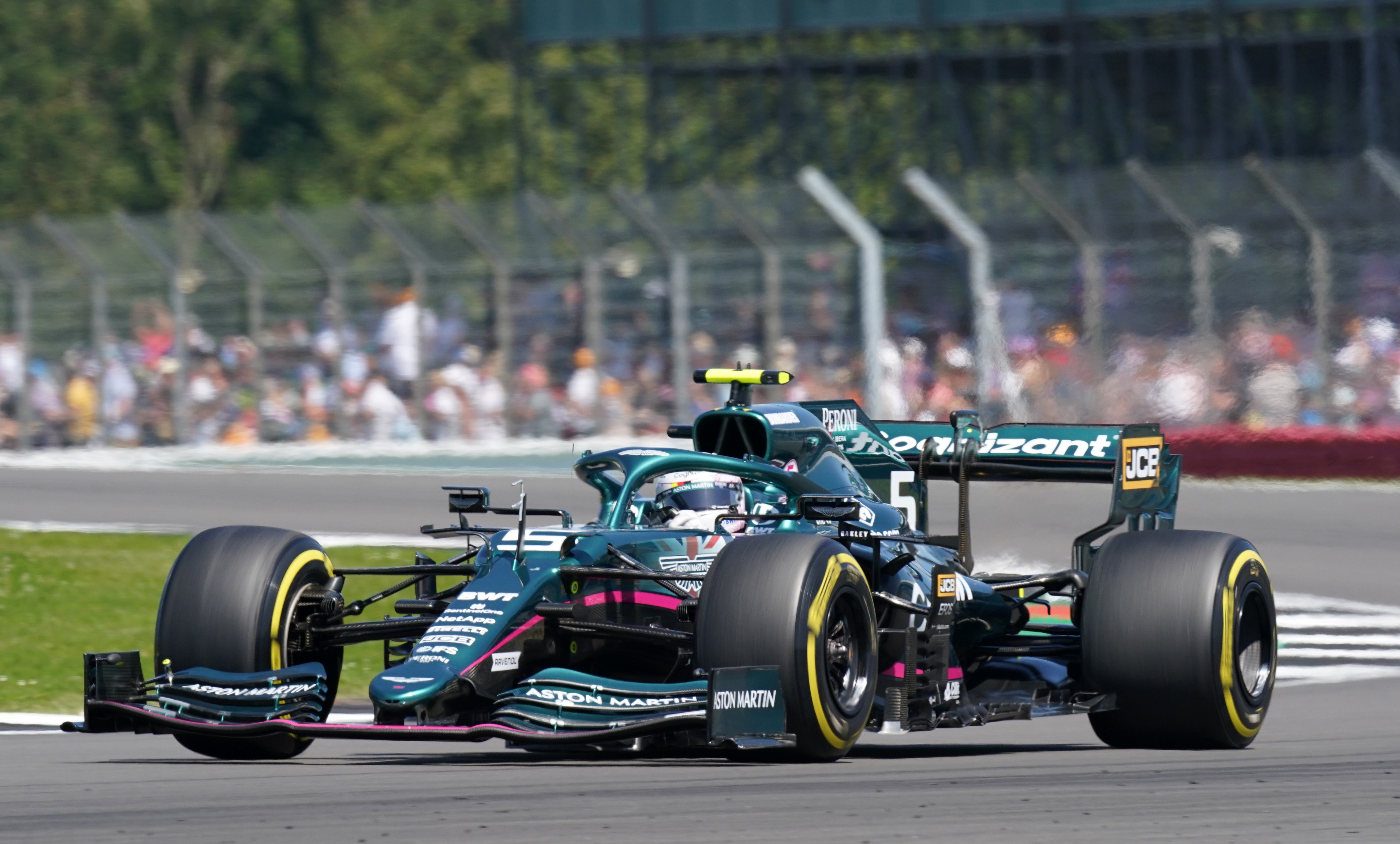 Sebastian Vettel will continue for Aston Martin in 2022 (Tim Goode/PA)