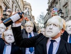 ‘This is a work event’: Dozens dressed as Boris Johnson dance outside Downing Street