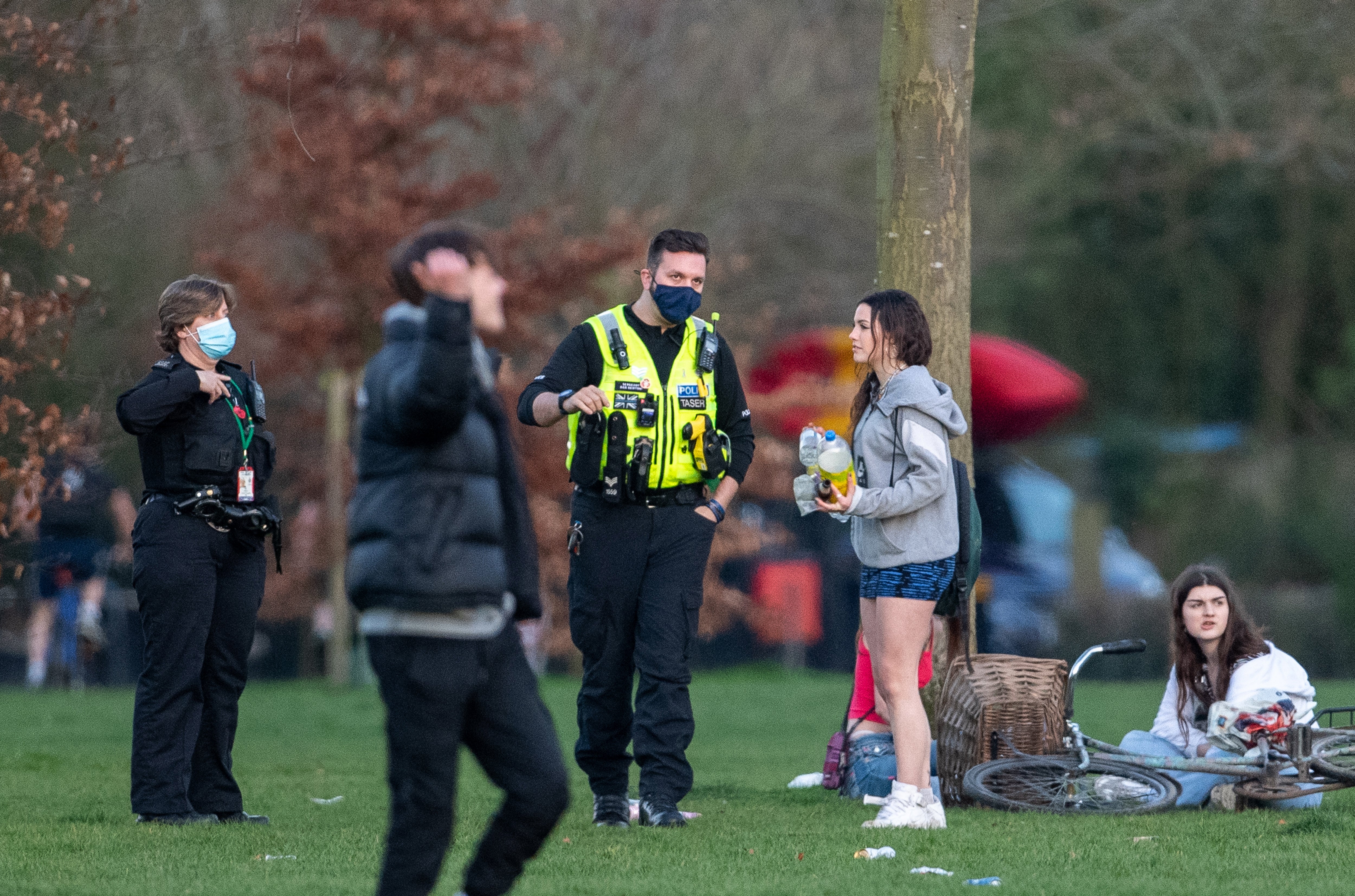 Police dispersing people during lockdown in the spring of 2021 (Joe Giddens/PA)