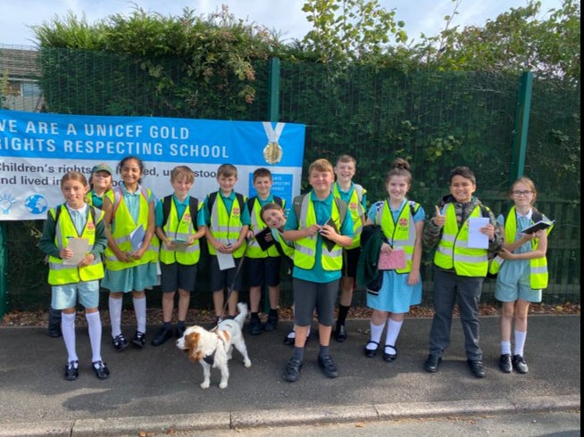 Pupils at Holy Cross Catholic Primary School monitor streets outside the school