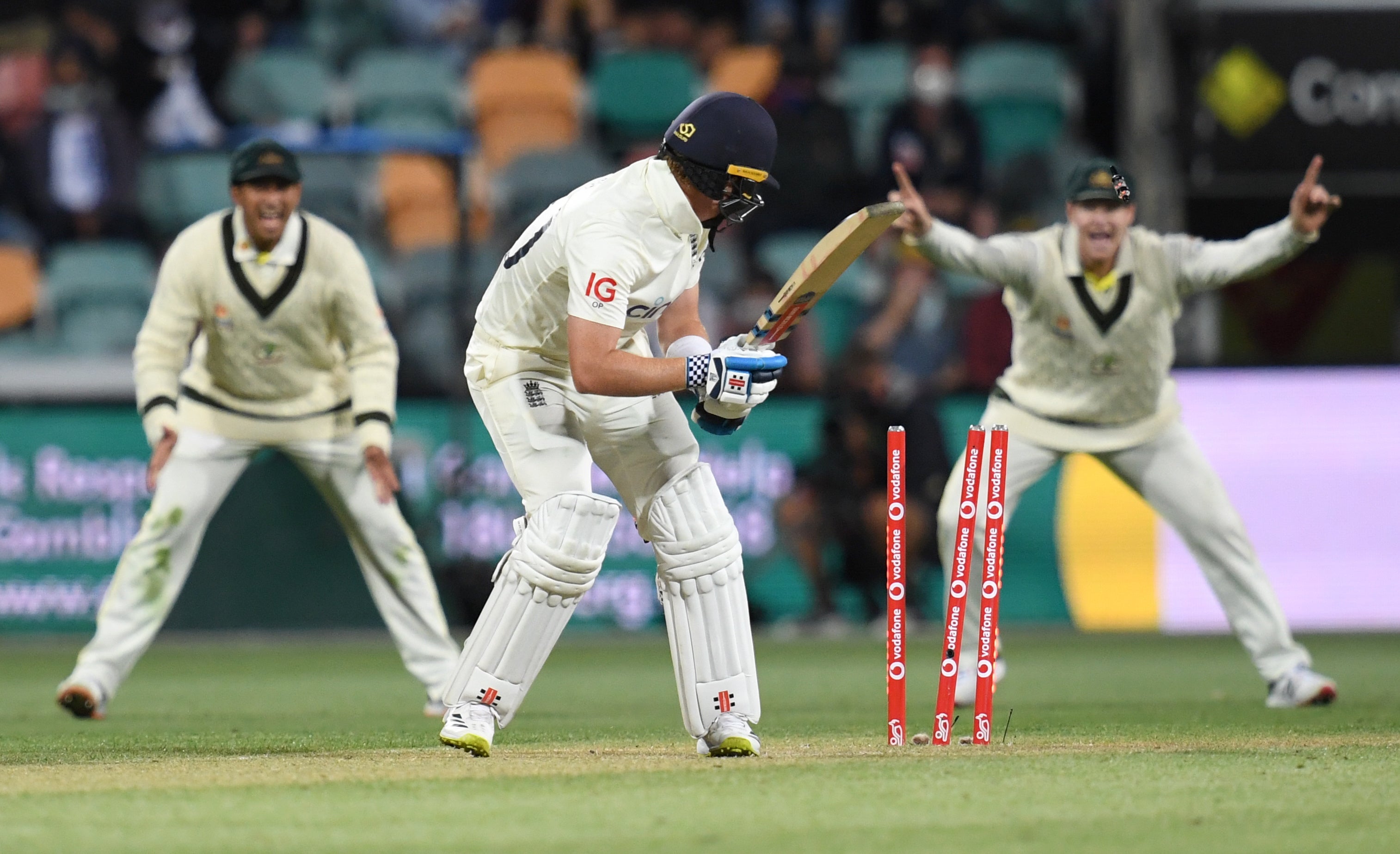 Ollie Pope is bowled by Pat Cummins