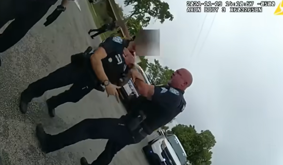 Police officer Christopher Pullease was seen in body camera video choking his colleague who tried to stop him from attacking a suspect