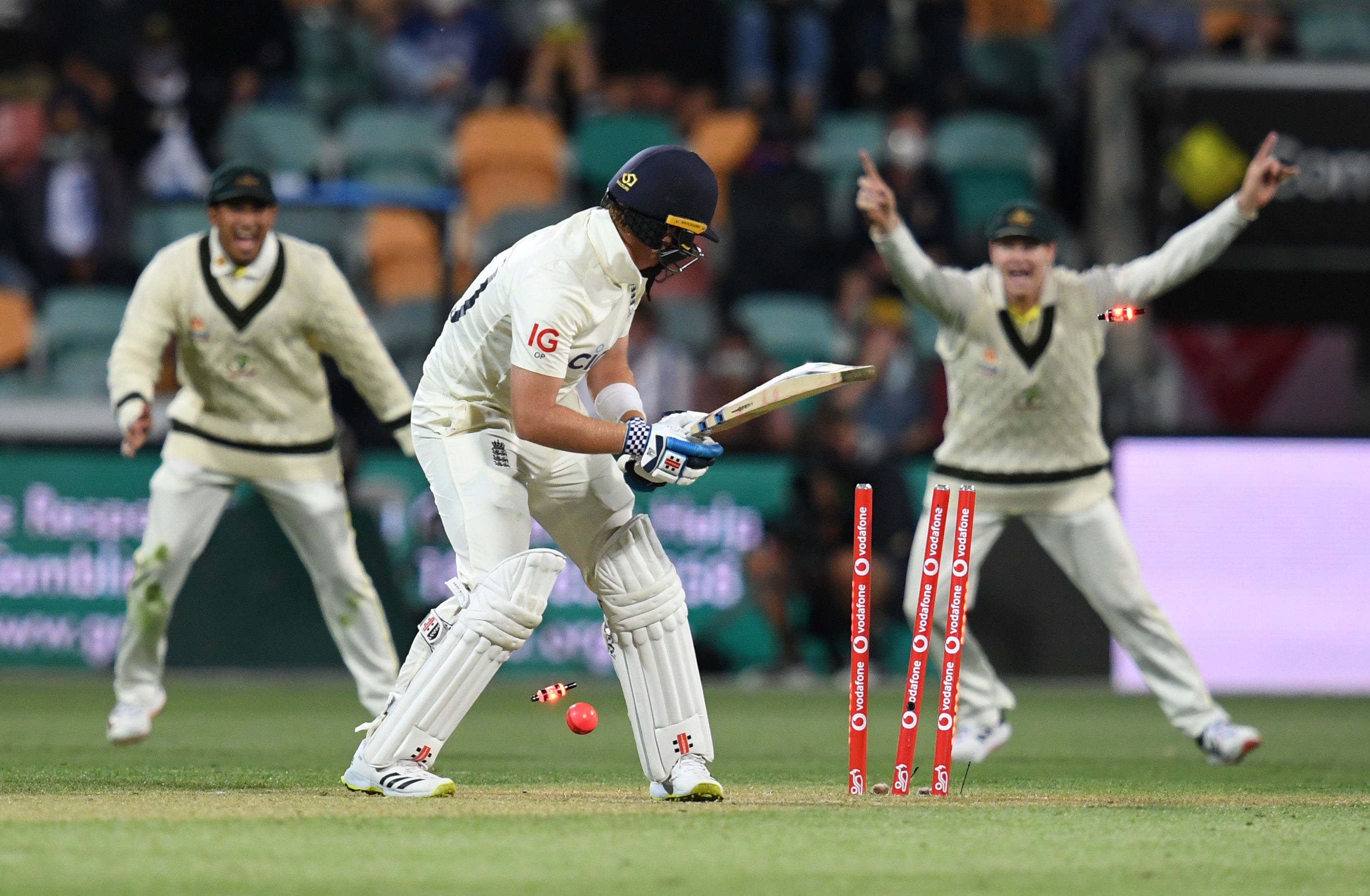 England's Ollie Pope is clean bowled by Australia's Pat Cummins