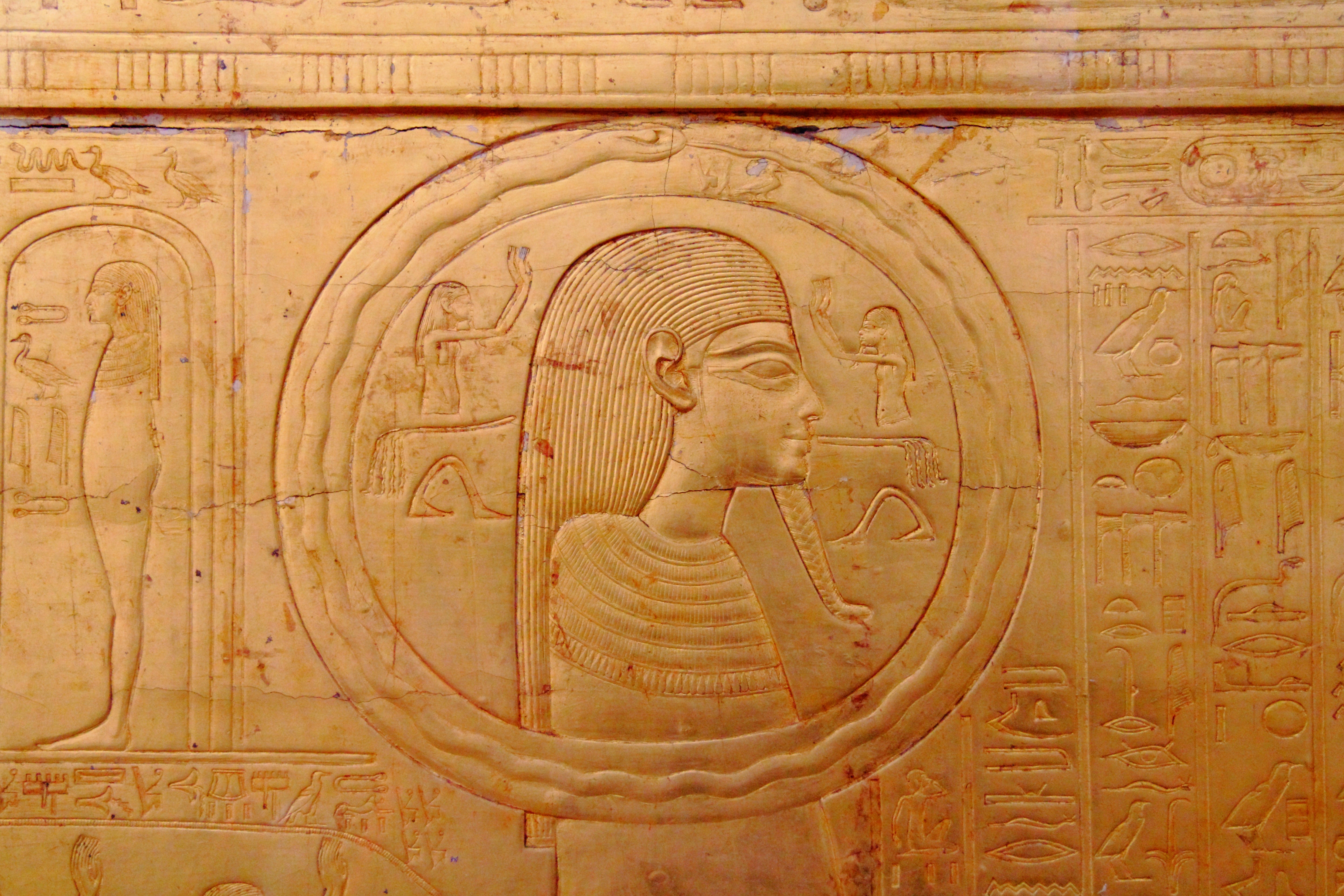 First known representation of the ouroboros on one of the shrines enclosing the sarcophagus of Tutankhamun