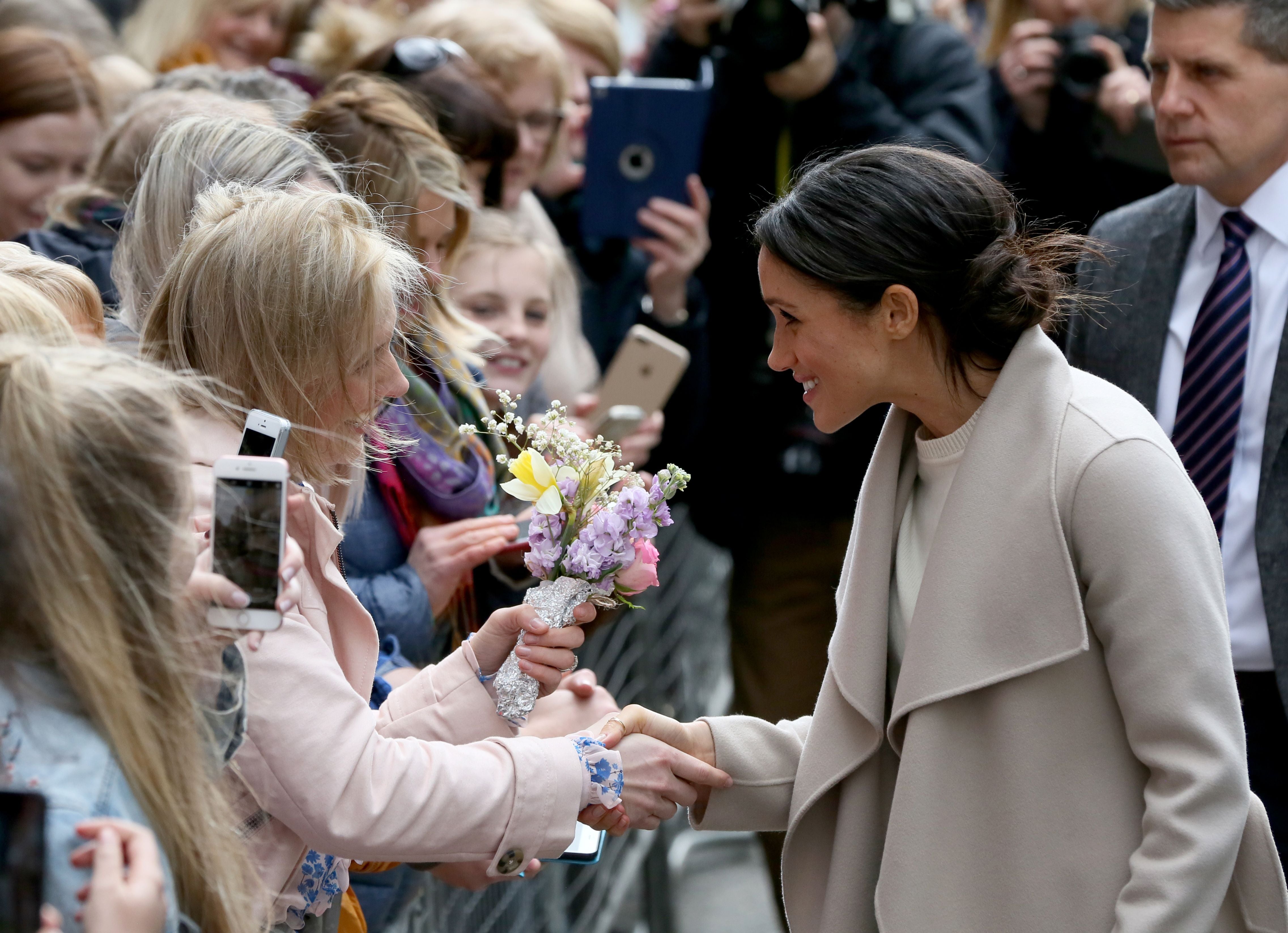 Meghan Markle received the flowers from a royal fan in Northern Ireland