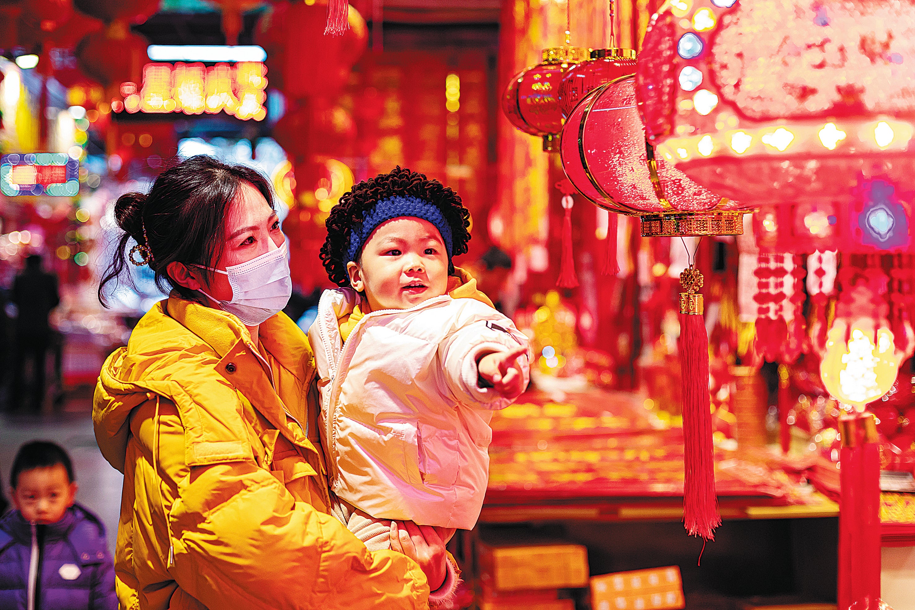 Lanterns attract consumers at a festival celebration product market in Hai’an, Jiangsu province