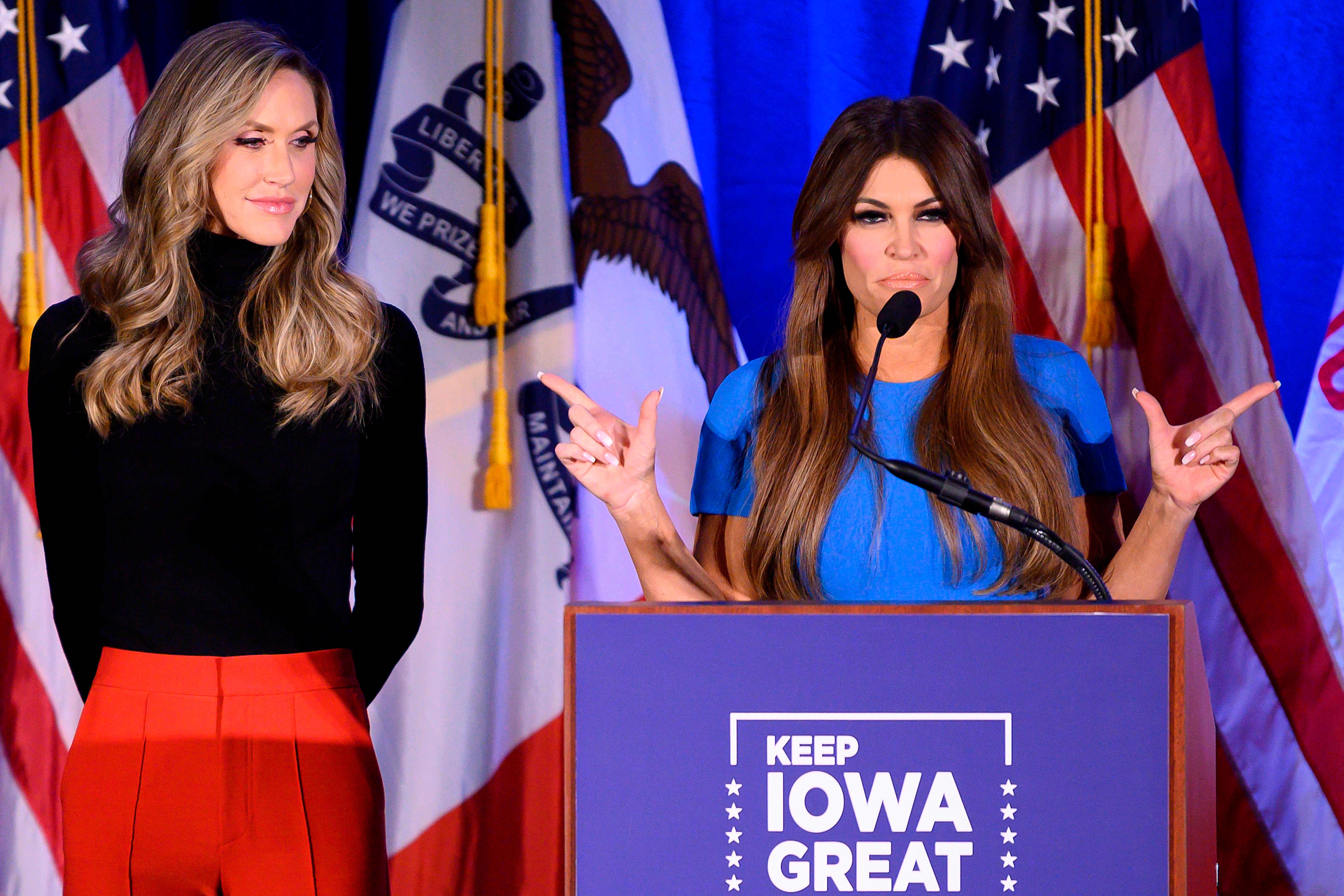 Donald Trump Jr’s girlfriend Kimberly Guilfoyle (R) speaks with Lara Trump (L), the wife of Eric Trump, during a “Keep Iowa Great” press conference in 2020