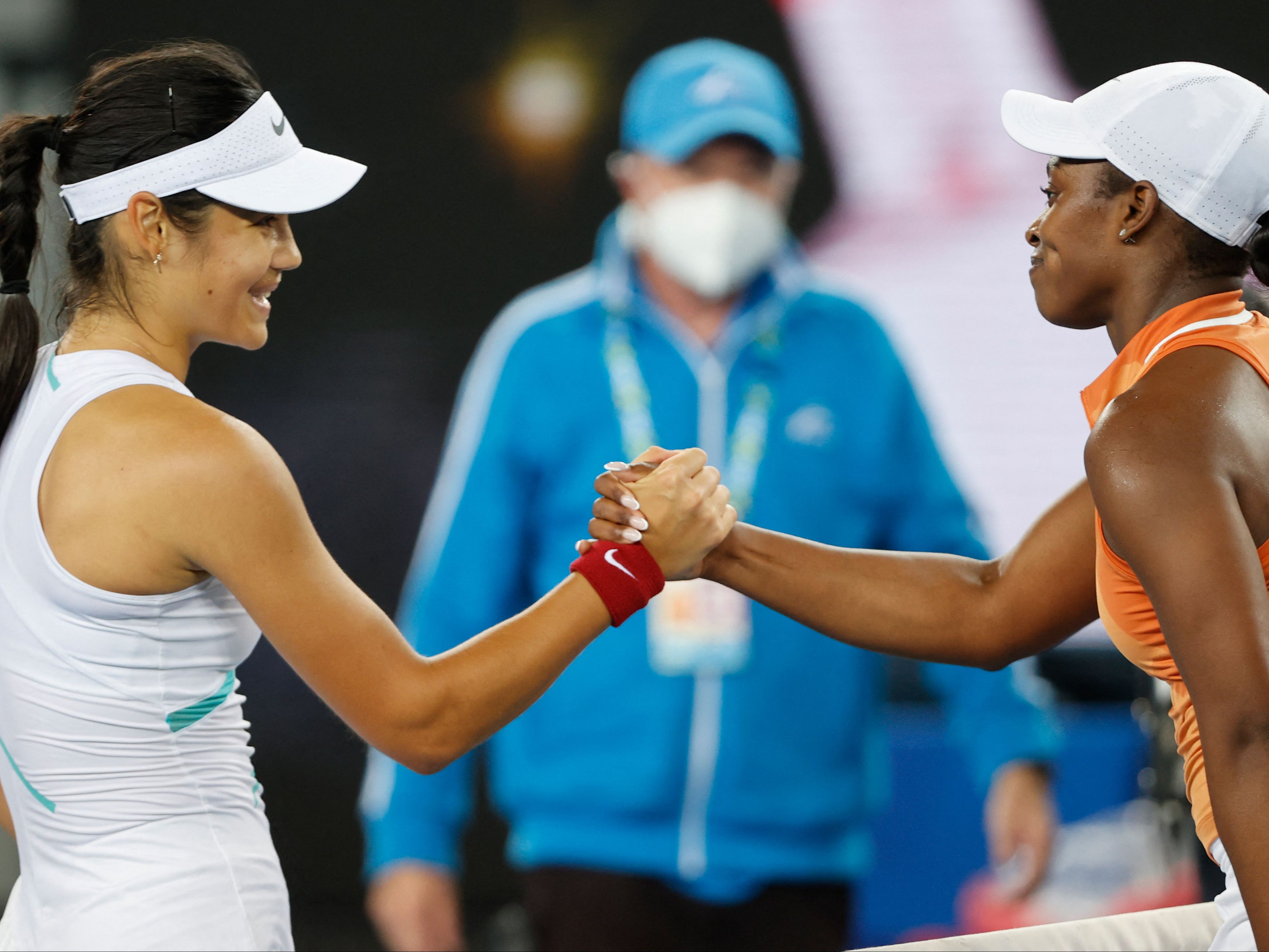 Emma Raducanu shakes hands with Sloane Stephens