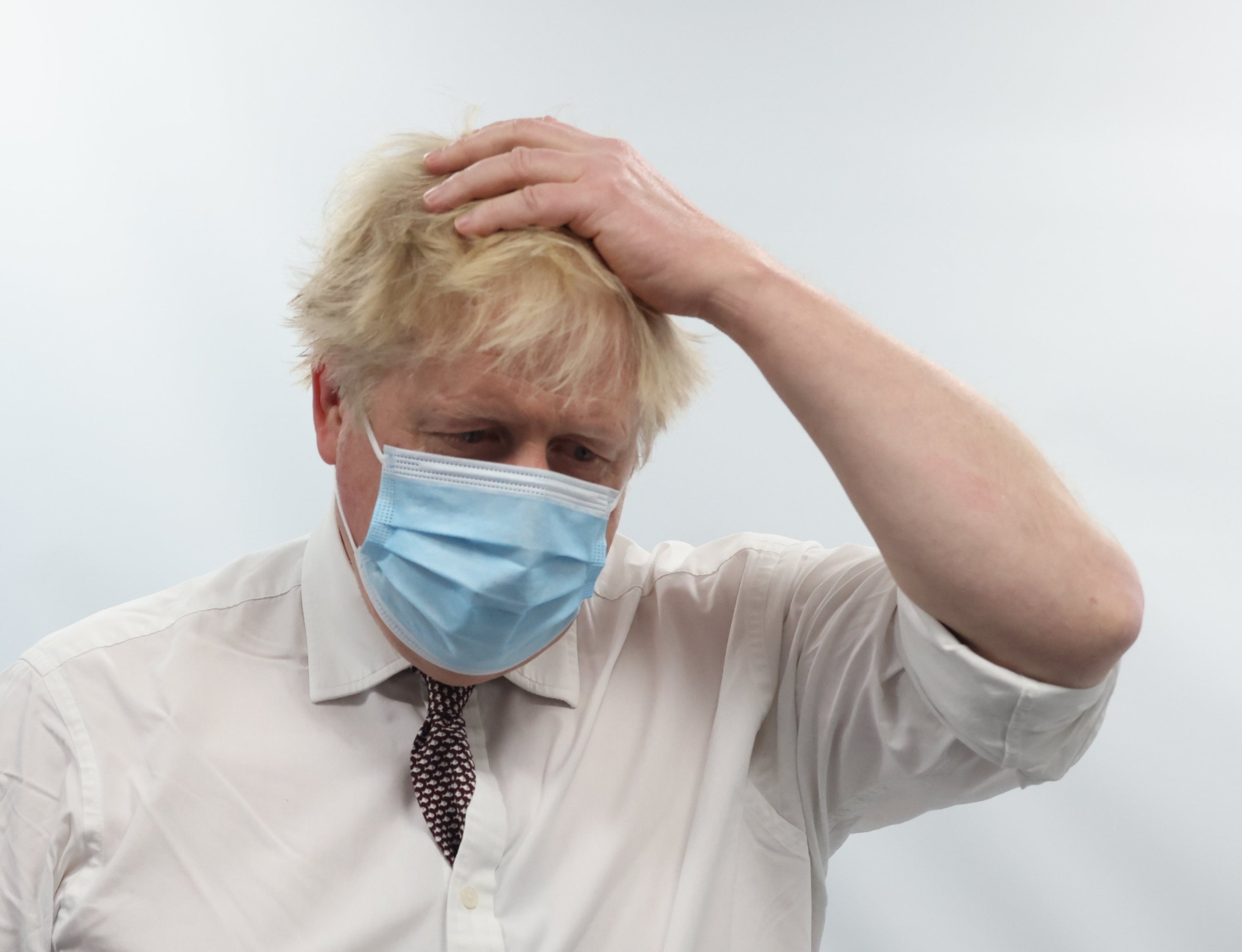 Prime Minister Boris Johnson talks to staff during a visit to the Finchley Memorial Hospital in north London (Ian Vogler/PA)