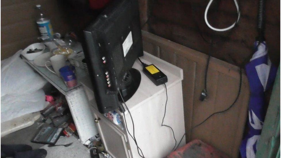 Shed contained a metered TV and a soiled mattress on the floor