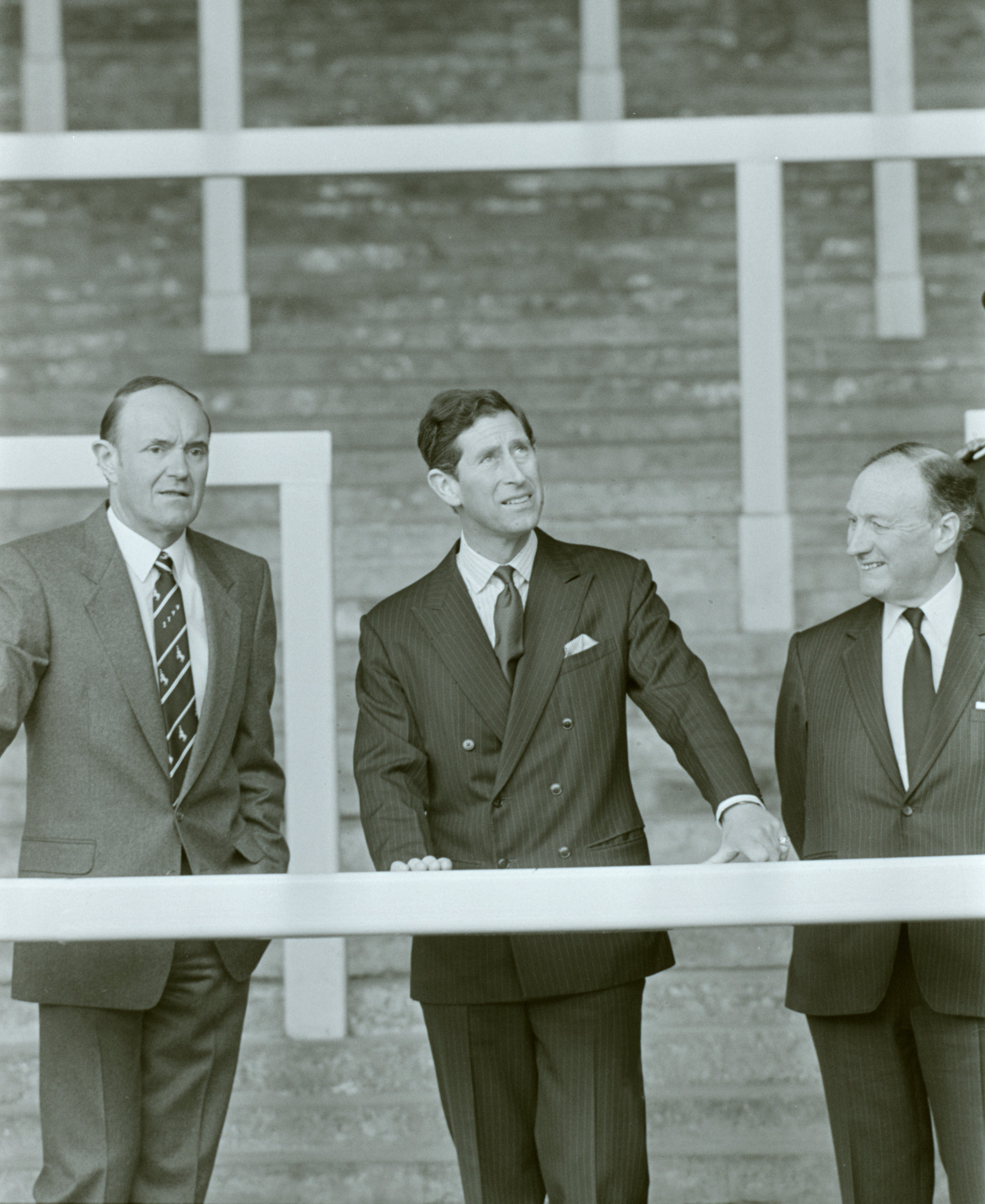 Peter Robinson (left), pictured with the Prince of Wales and chairman John Smith (right), served Liverpool for 35 years