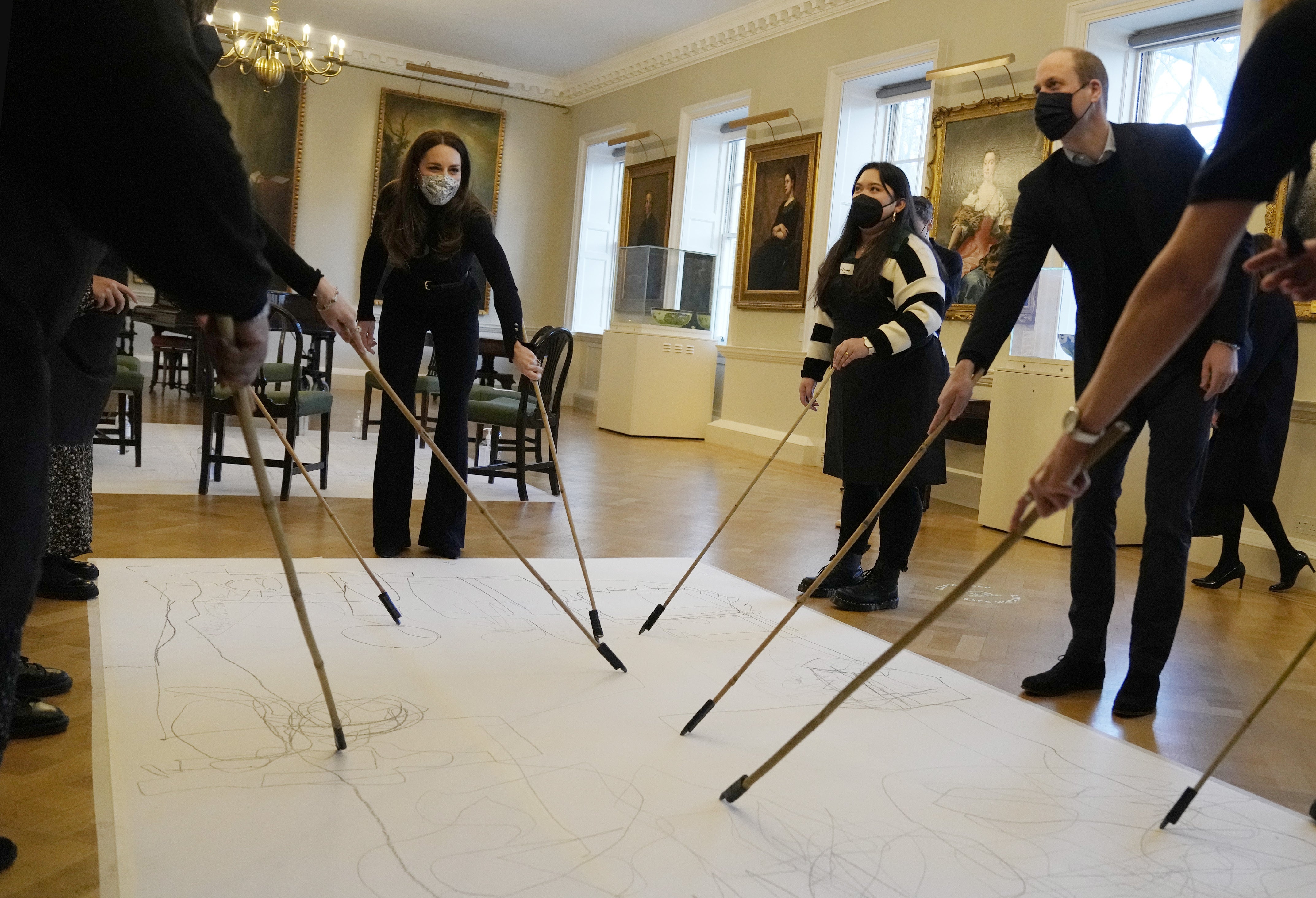 The Cambridges participated in a therapy session with individuals who had experienced the care system (Alastair Grant/PA)