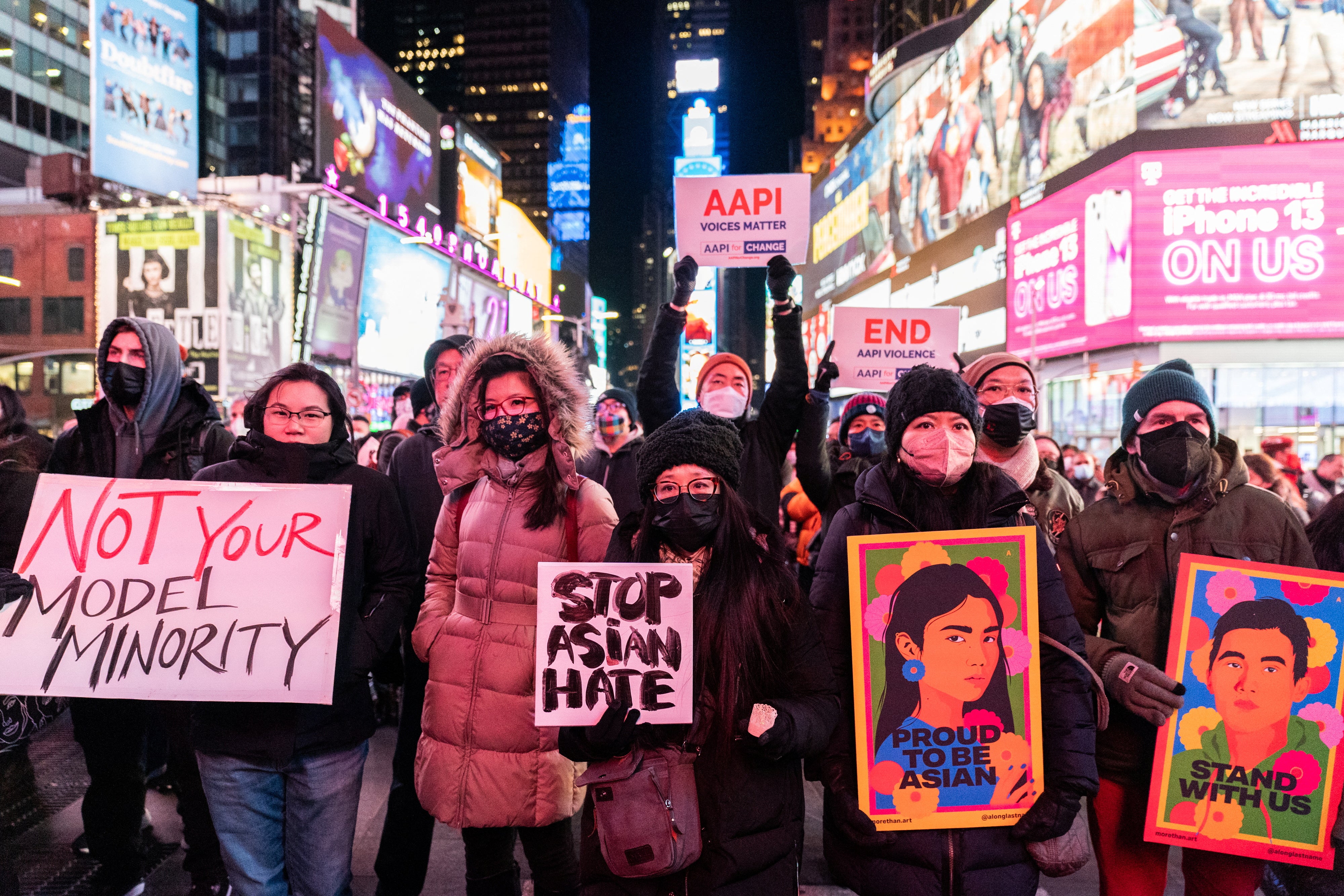 Hundreds gathered in New York City’s Times Square for a vigil recognising Michelle Go, who was pushed to her death from a subway platform on 15 January.