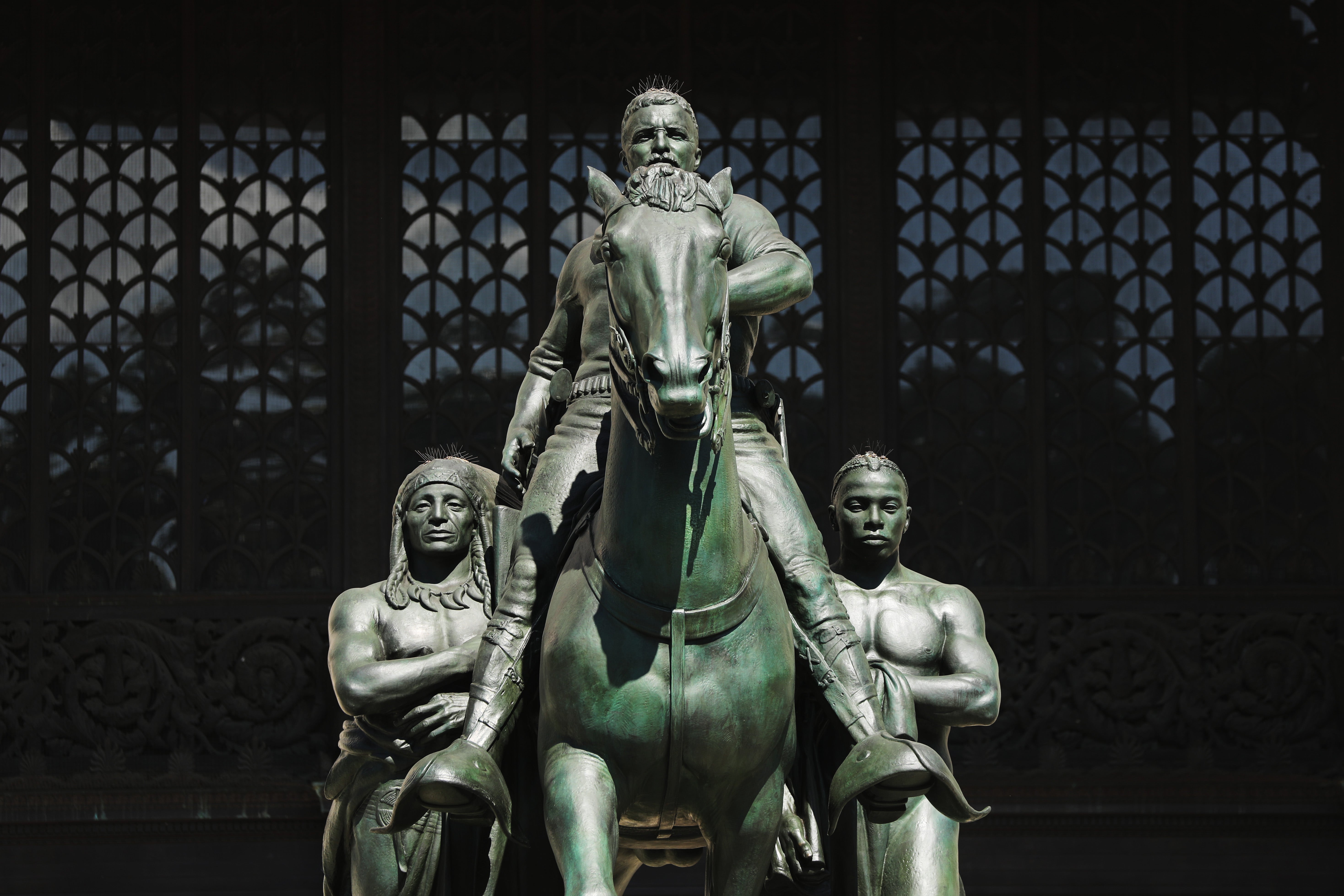 The controversial statue of former president Theodore Roosevelt, which has now been removed, stood outside the Museum of Natural History for over 80 years